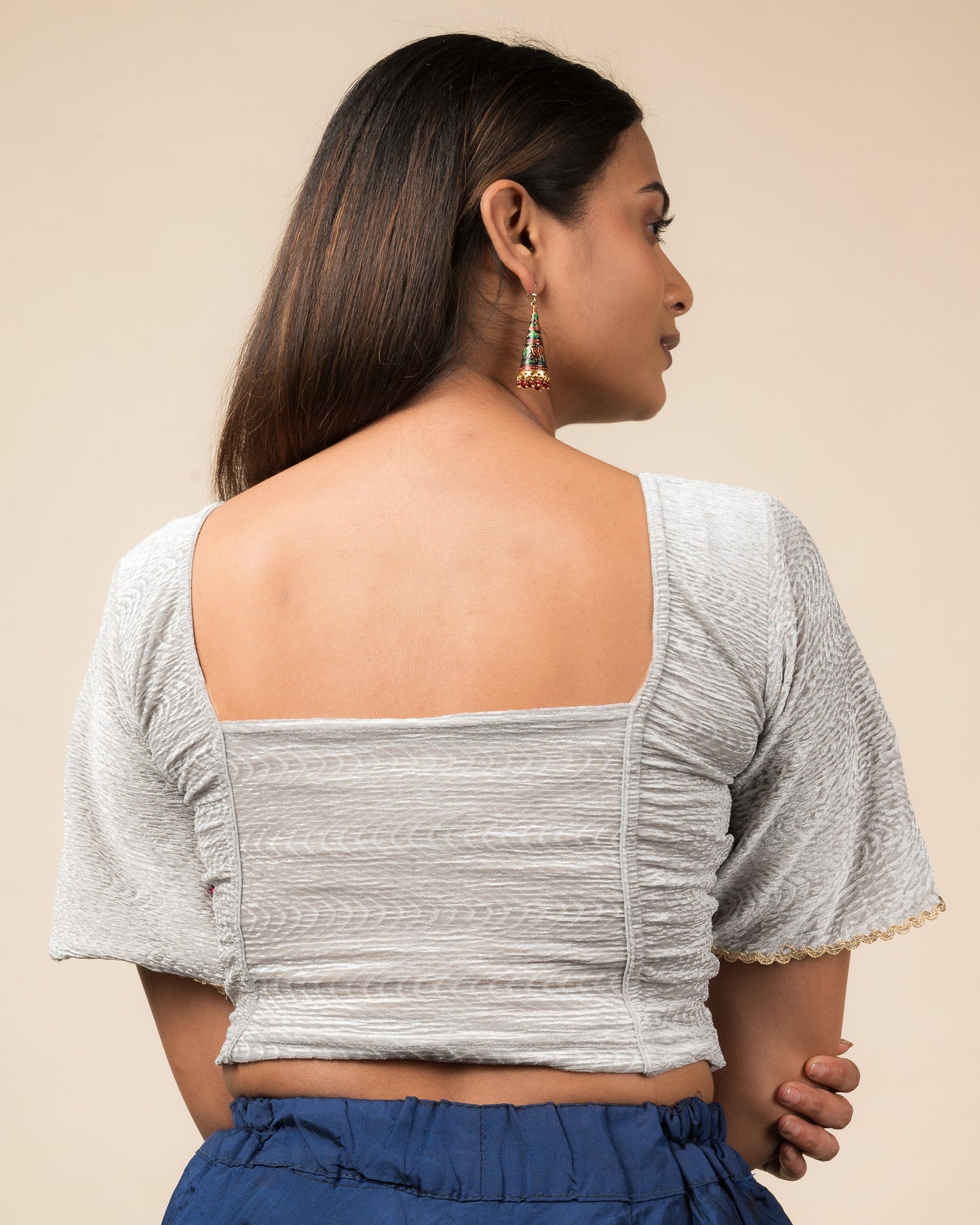 Rear view of the velvet stretchable blouse showcasing the back design.