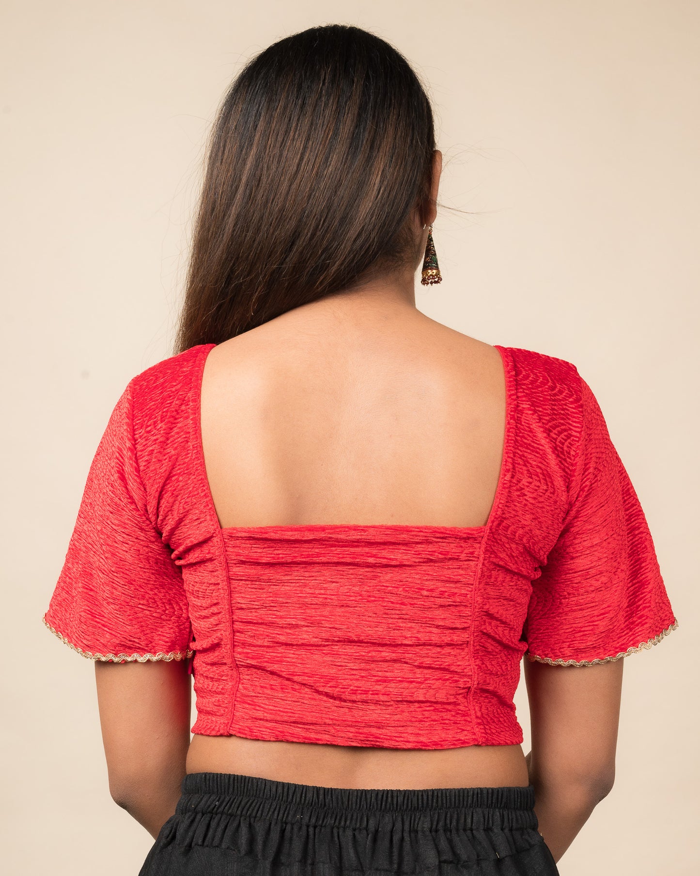 Rear view of the velvet stretchable blouse showcasing the back design.