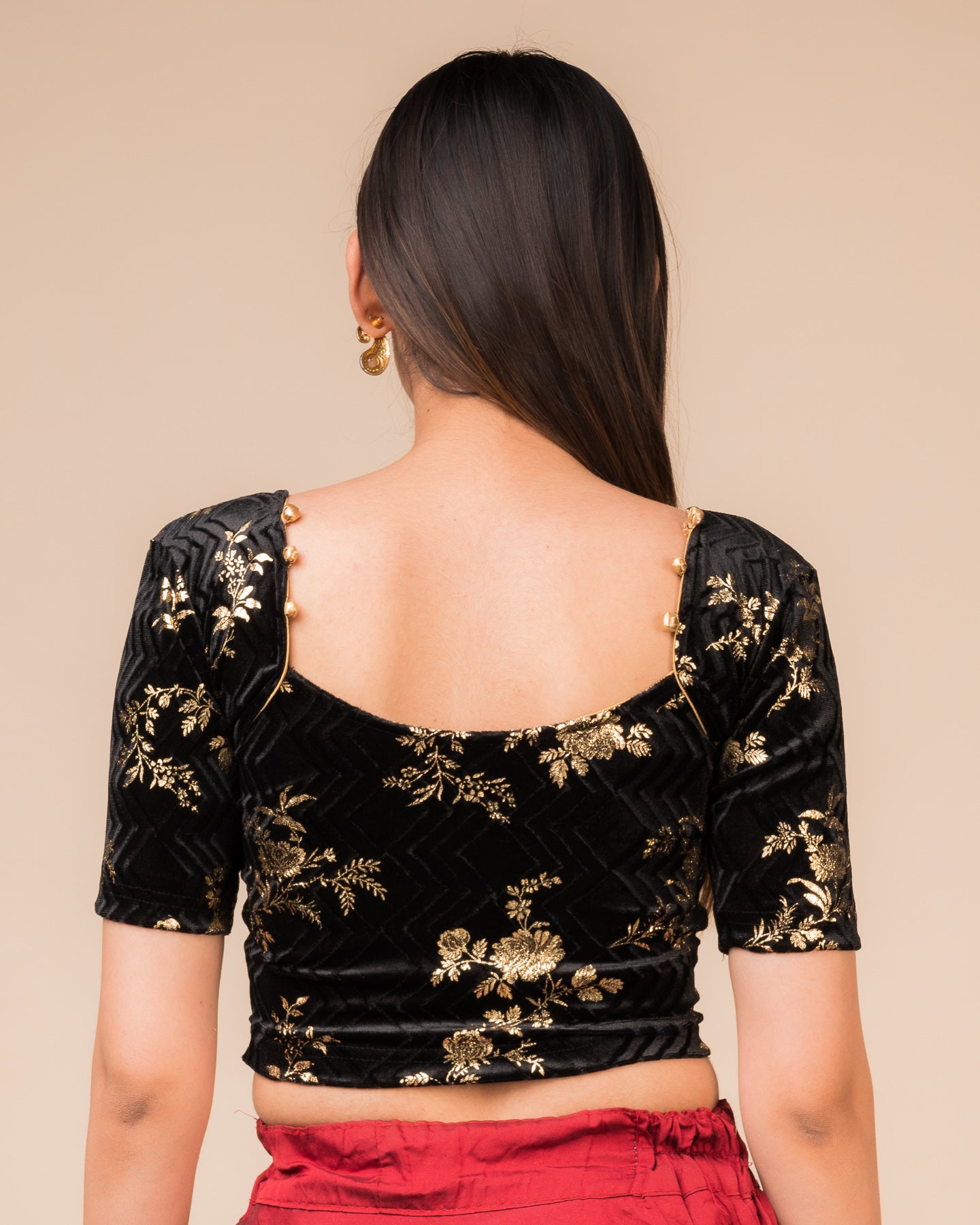 Rear view showcasing the potli-button detail at the back.
