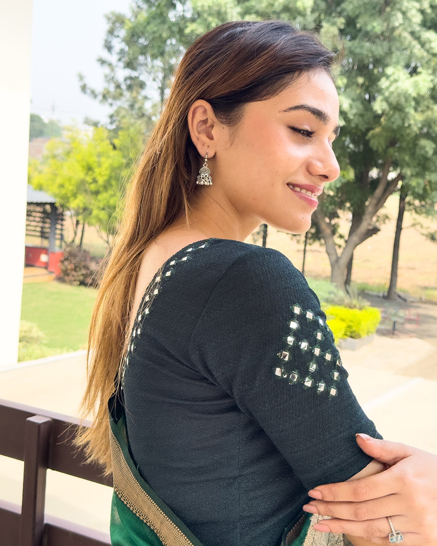 Side profile highlighting fit and sleeve structure.