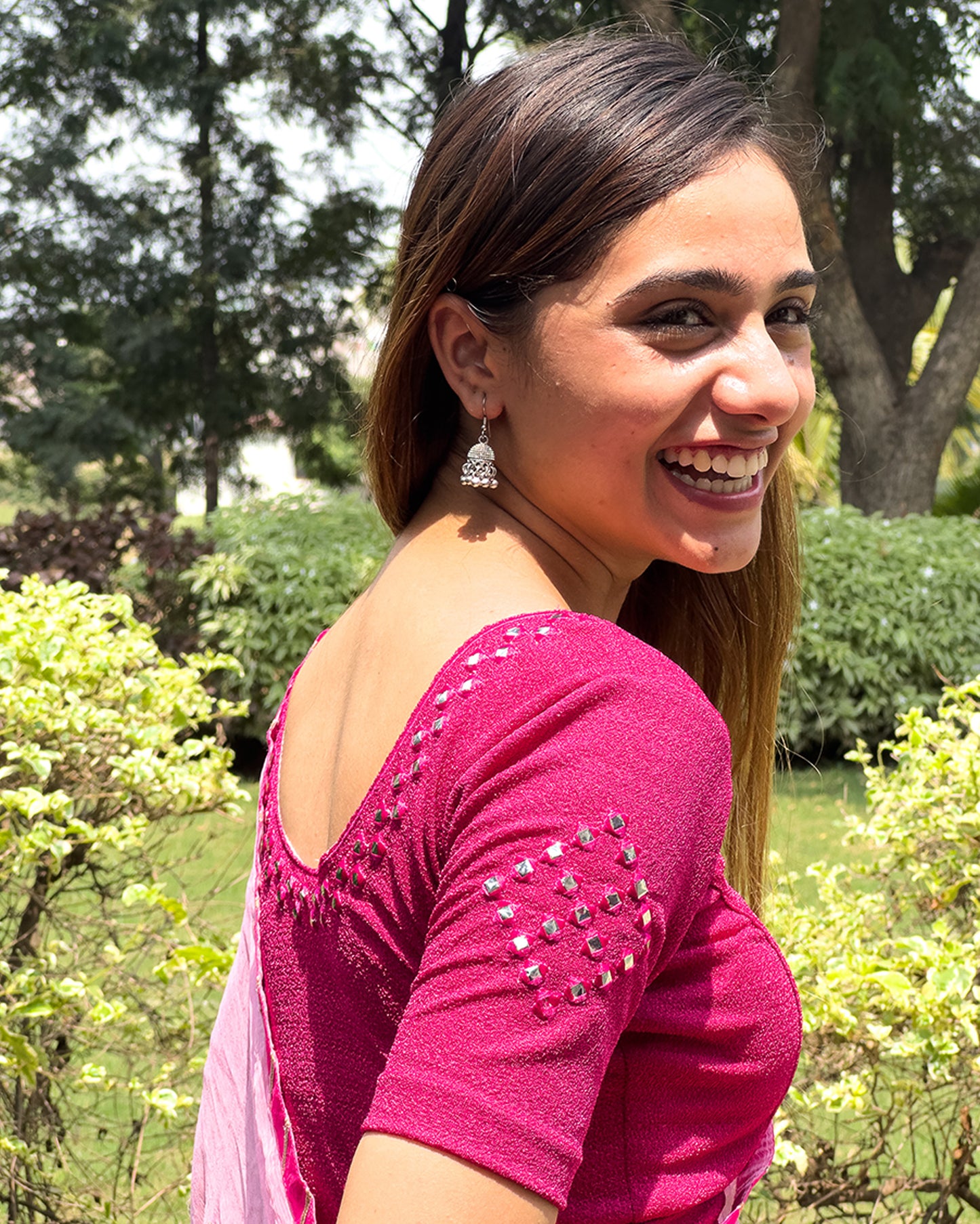 Side profile highlighting fit and sleeve structure.