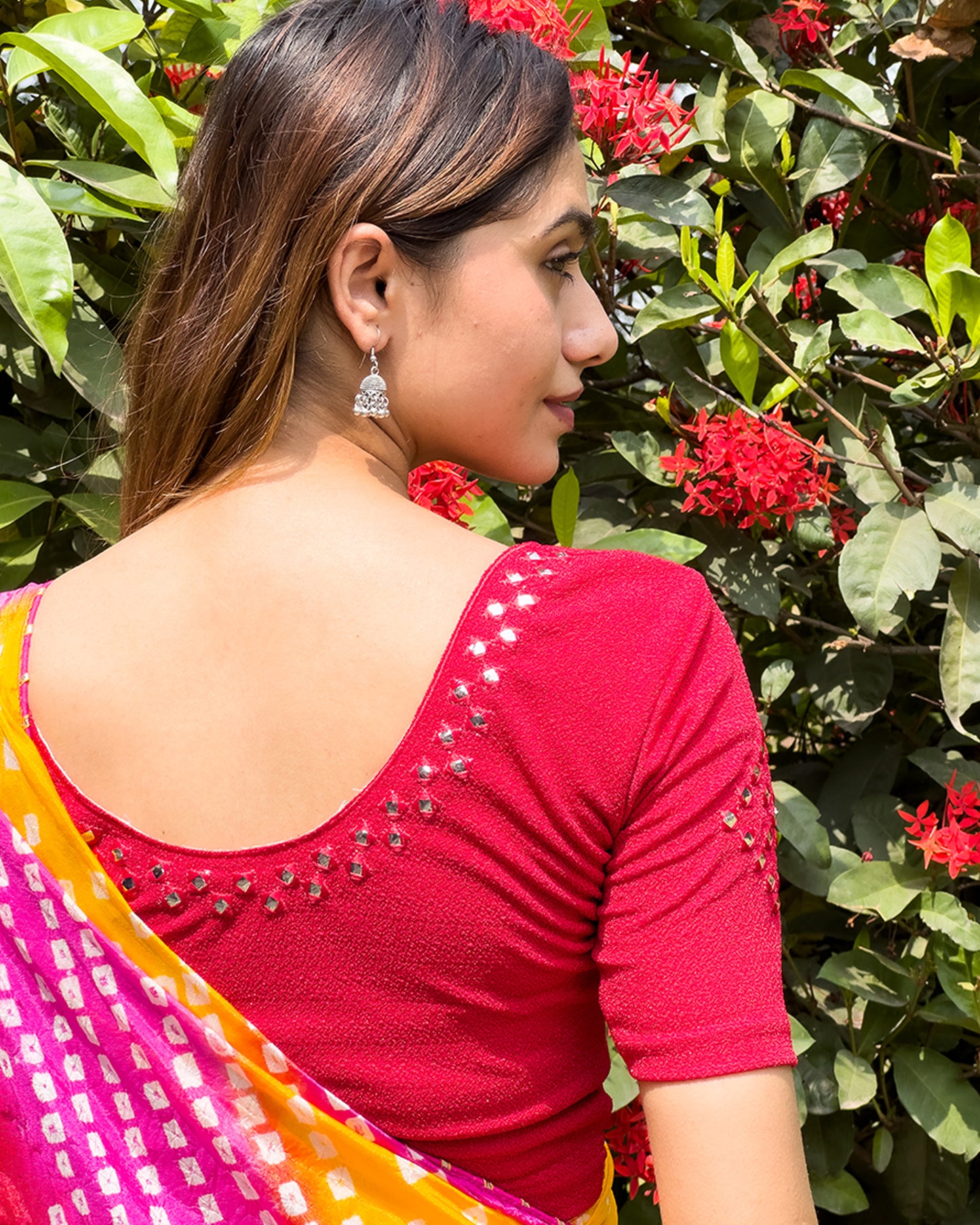 Rear view of the blouse showcasing the back design.