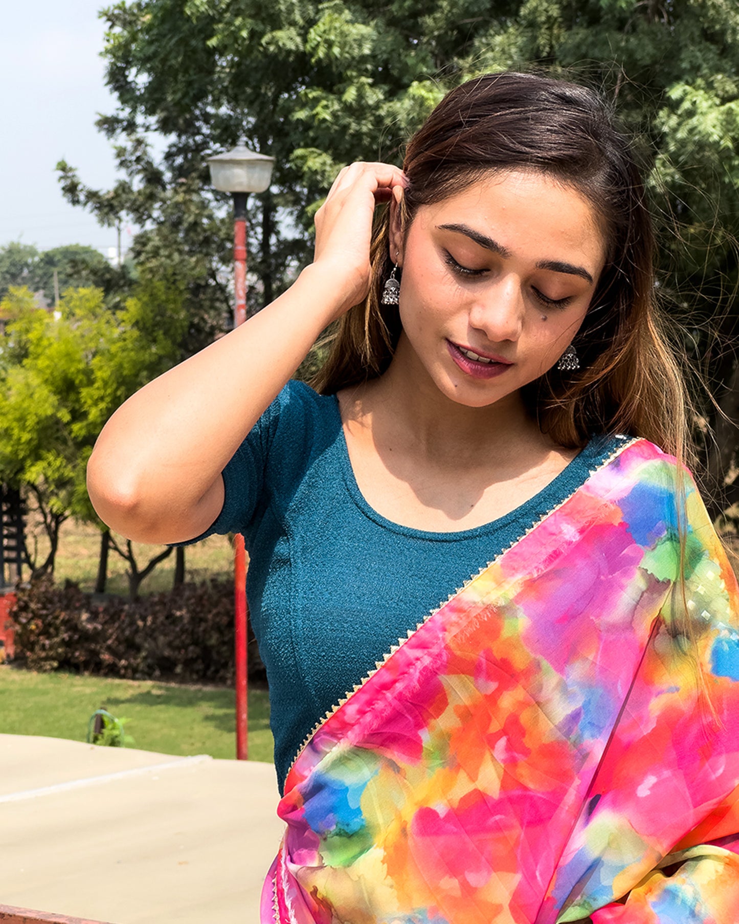 Model wearing the blouse with a saree for a festive ensemble ideal for Navratri.