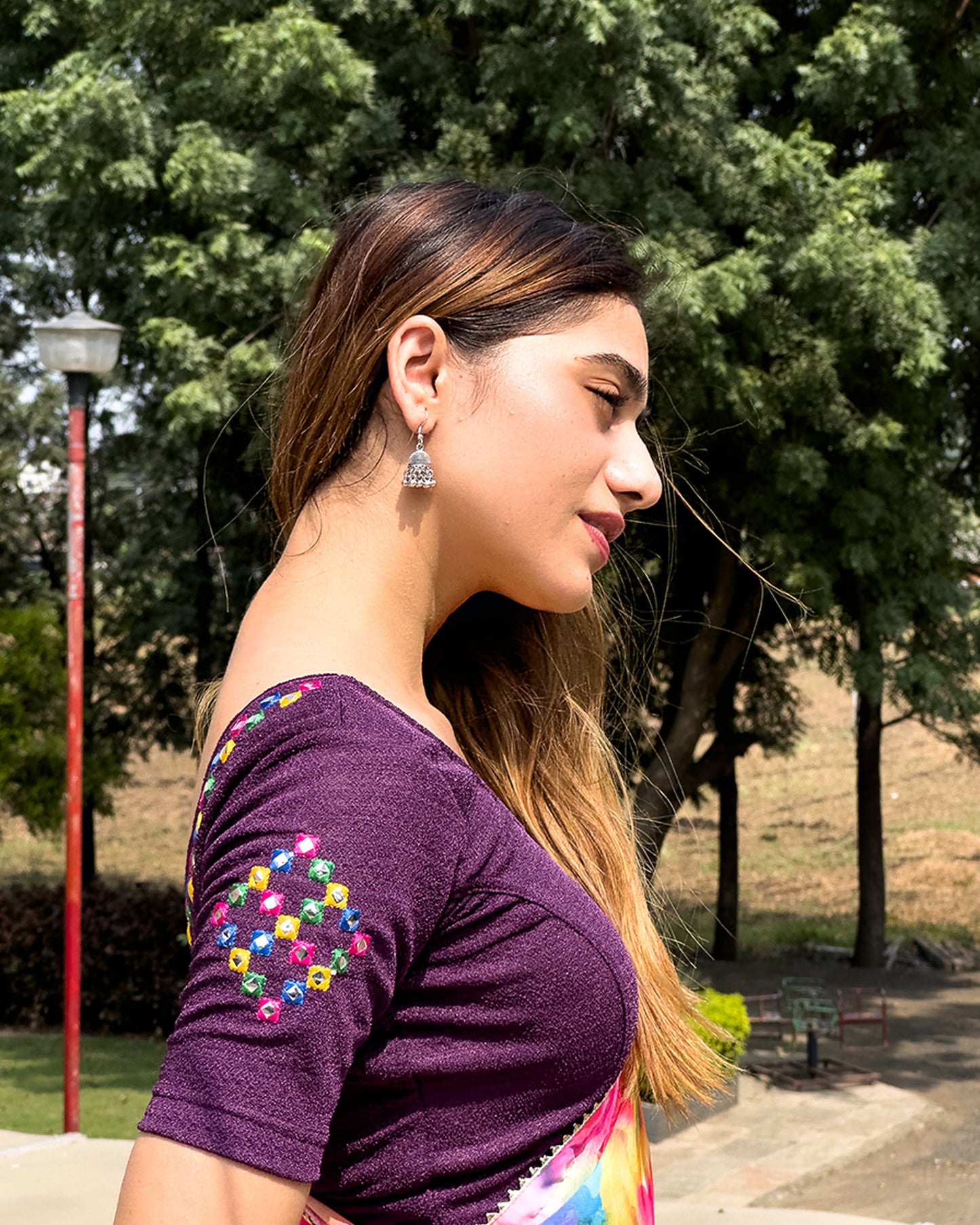 Side profile highlighting the sleeve shape and silhouette.