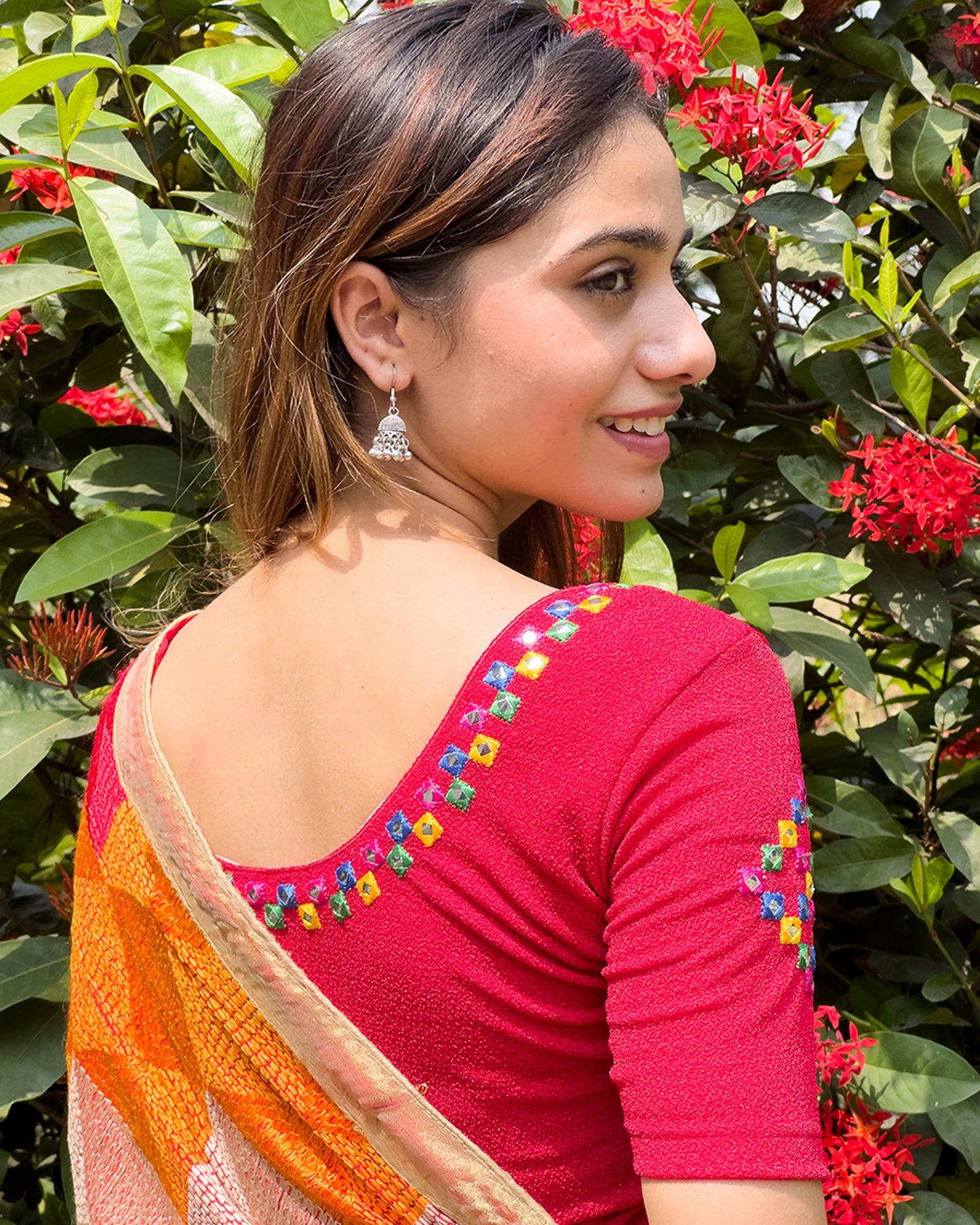 Rear view showcasing the embroidered details and back fit.