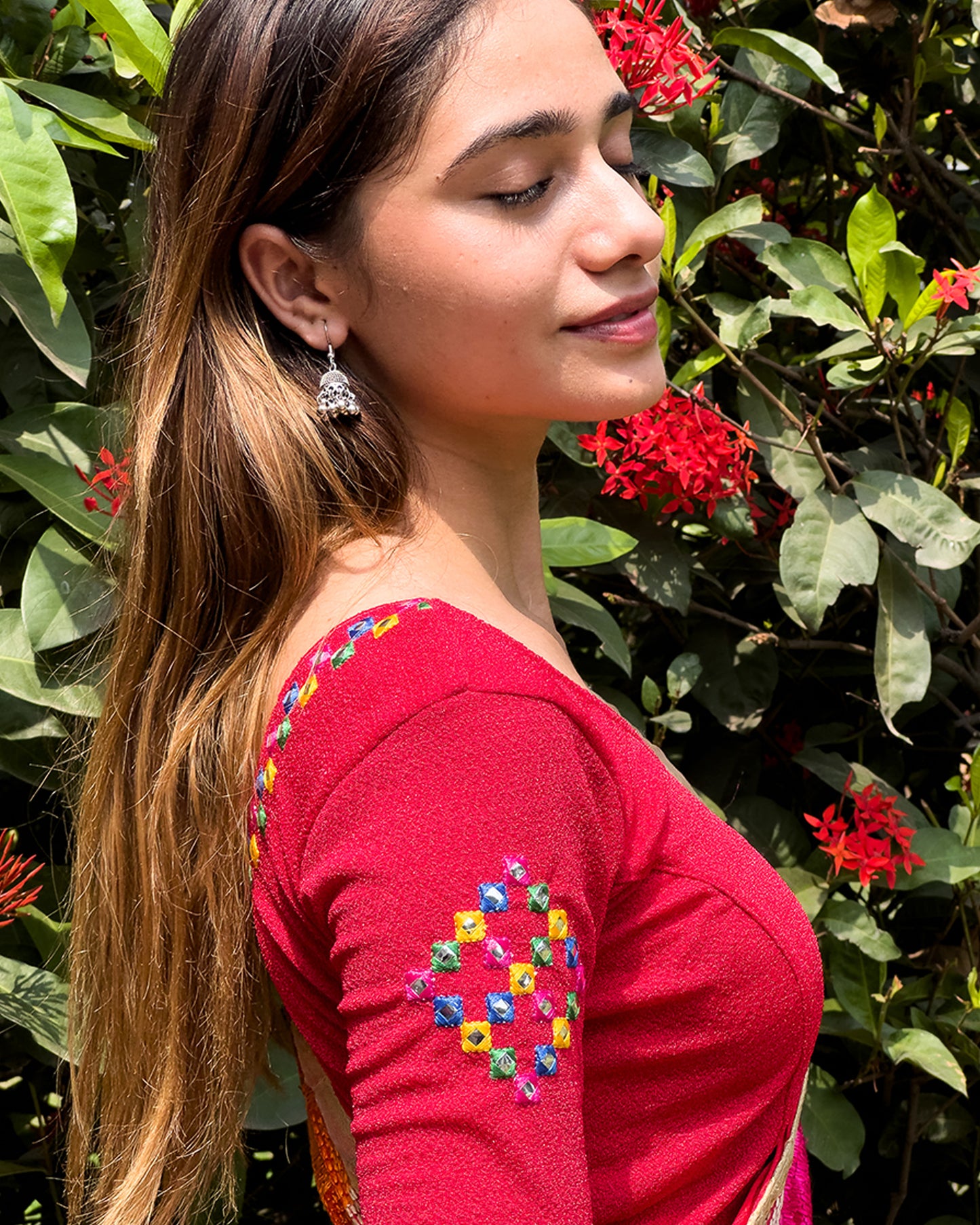 Side profile highlighting the sleeve shape and silhouette.