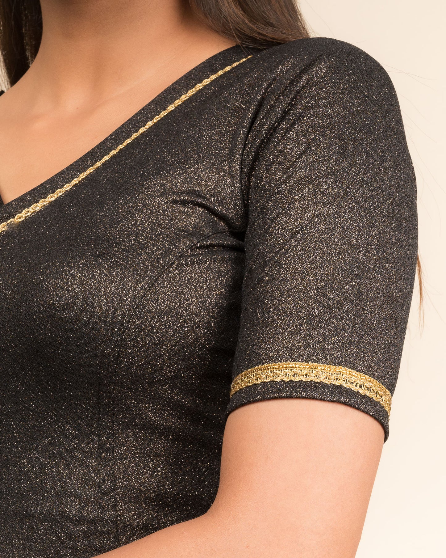 Close-up of the jacquard fabric with metallic finish.