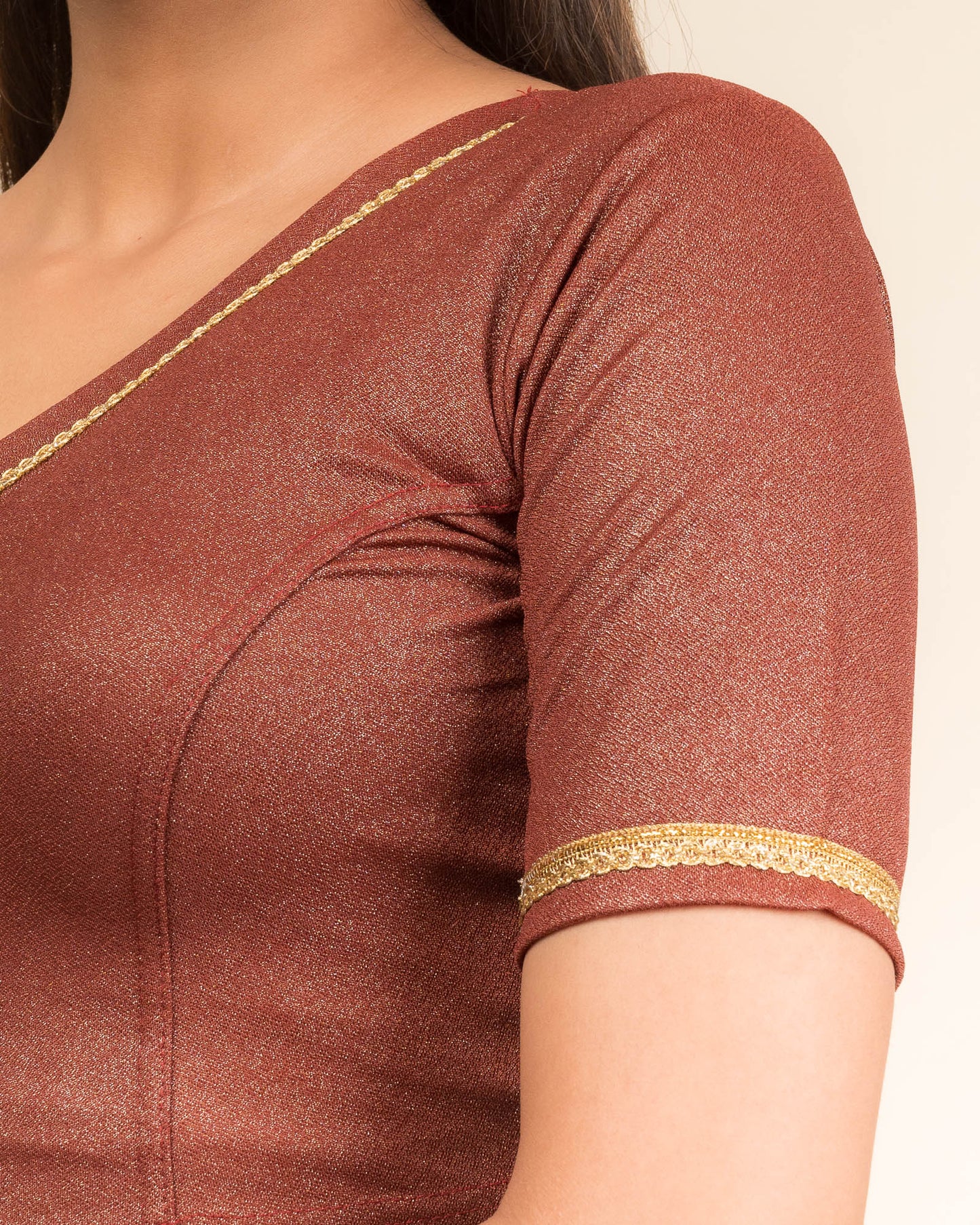 Close-up of the jacquard fabric with metallic finish.