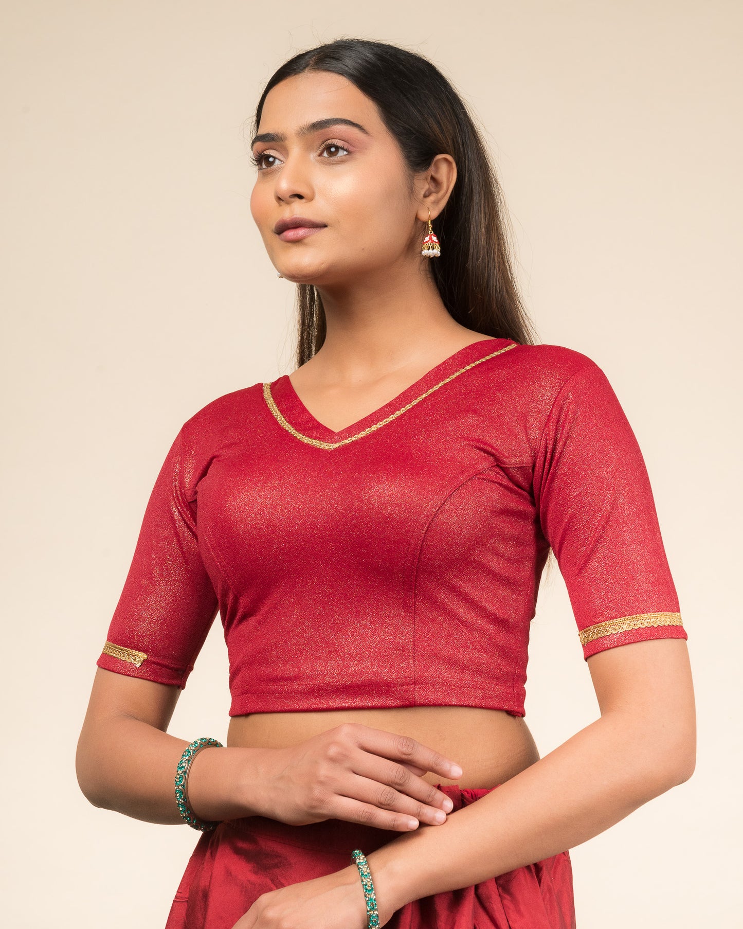 Side profile emphasizing sleeve structure and silhouette.