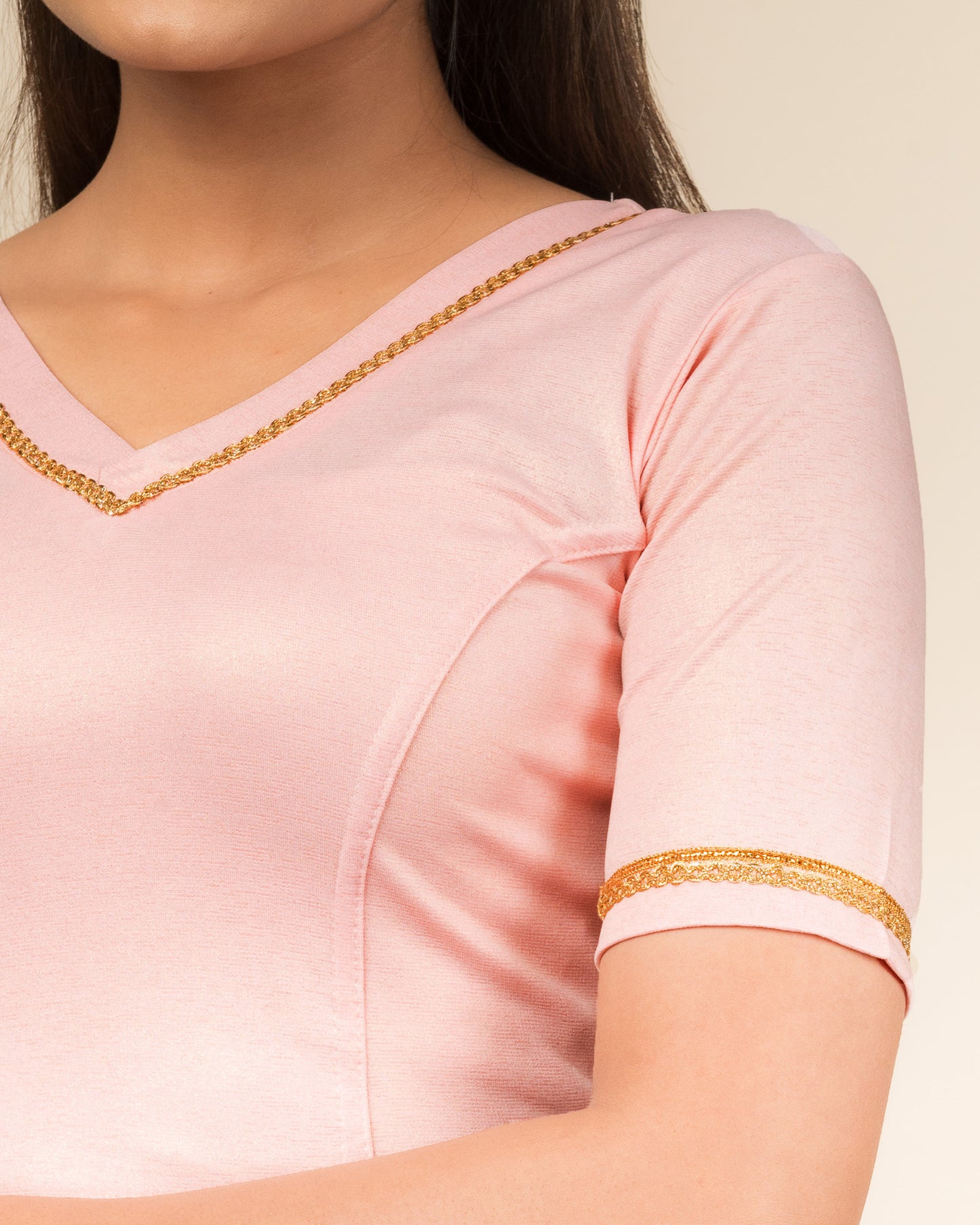Close-up of the jacquard fabric with metallic finish.