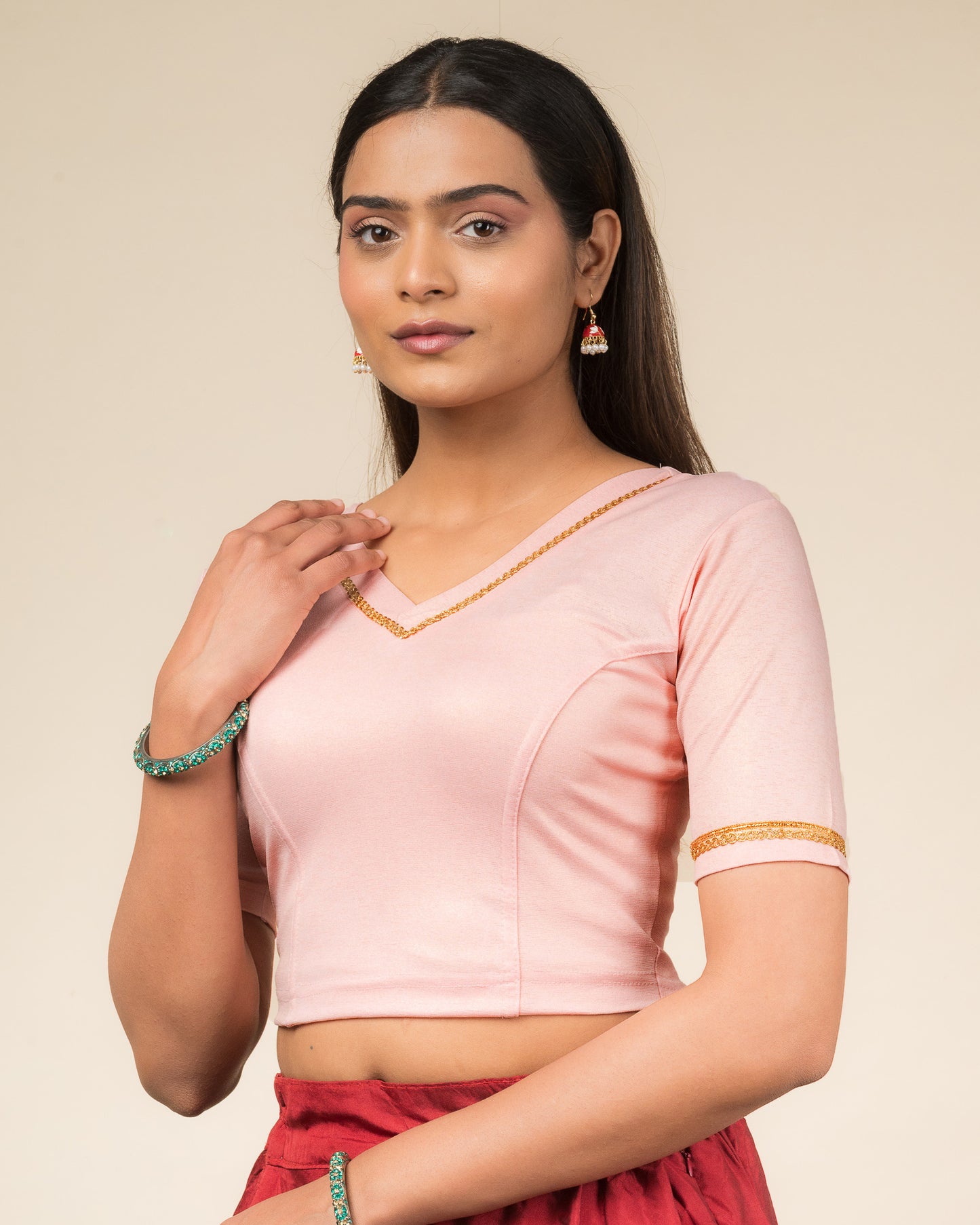 Side profile emphasizing sleeve structure and silhouette.