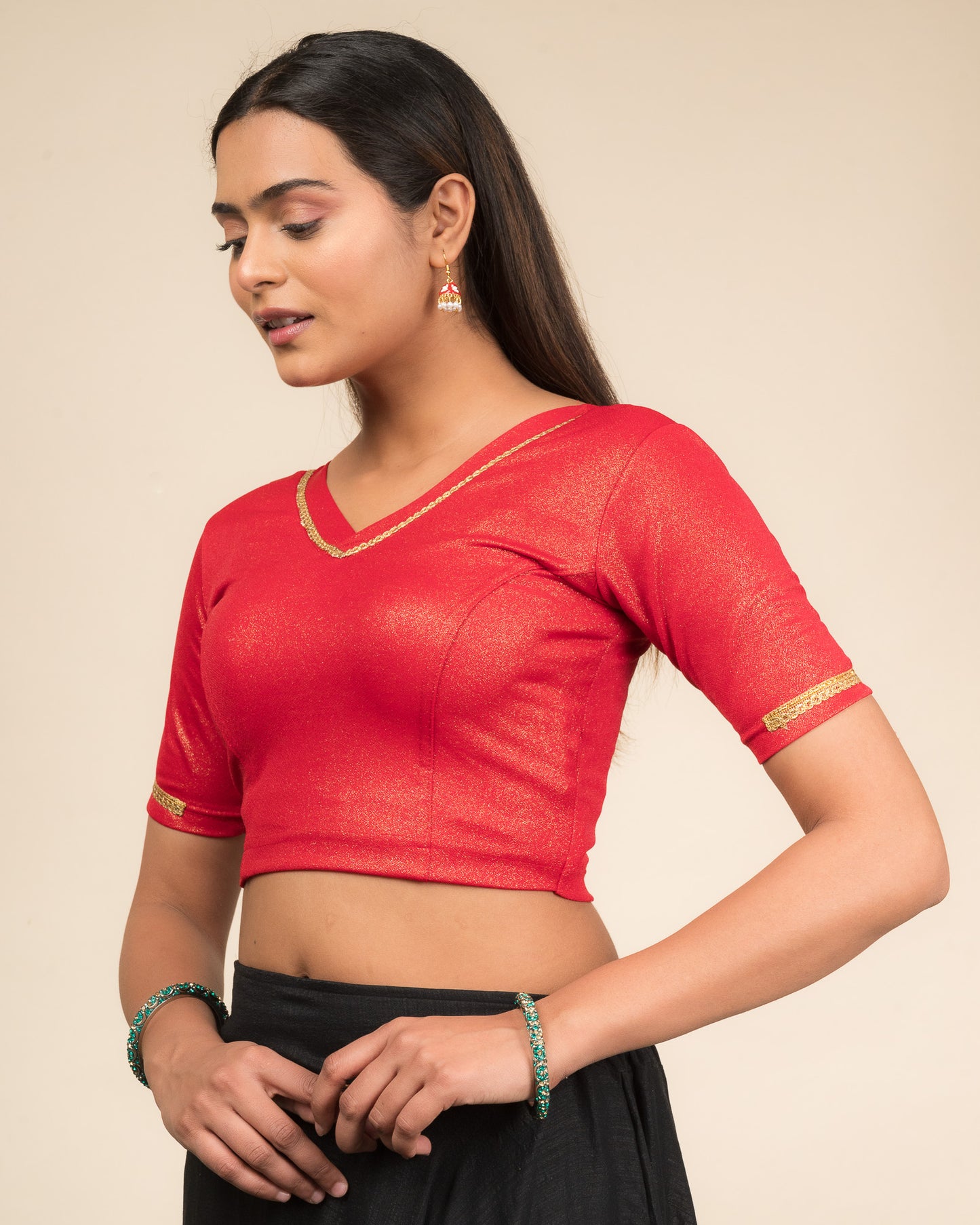 Side profile emphasizing sleeve structure and silhouette.