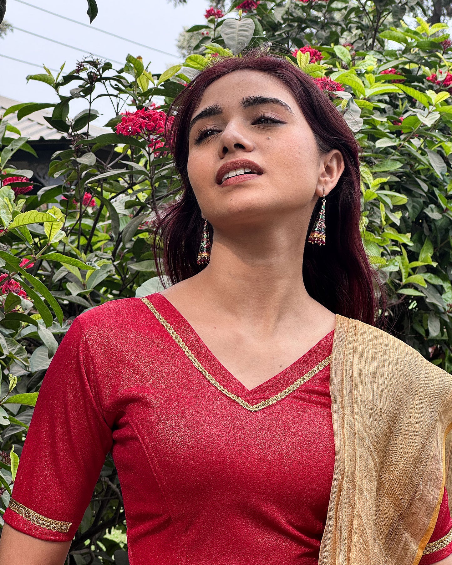 Model paired the blouse with a saree for a festive or evening occasion