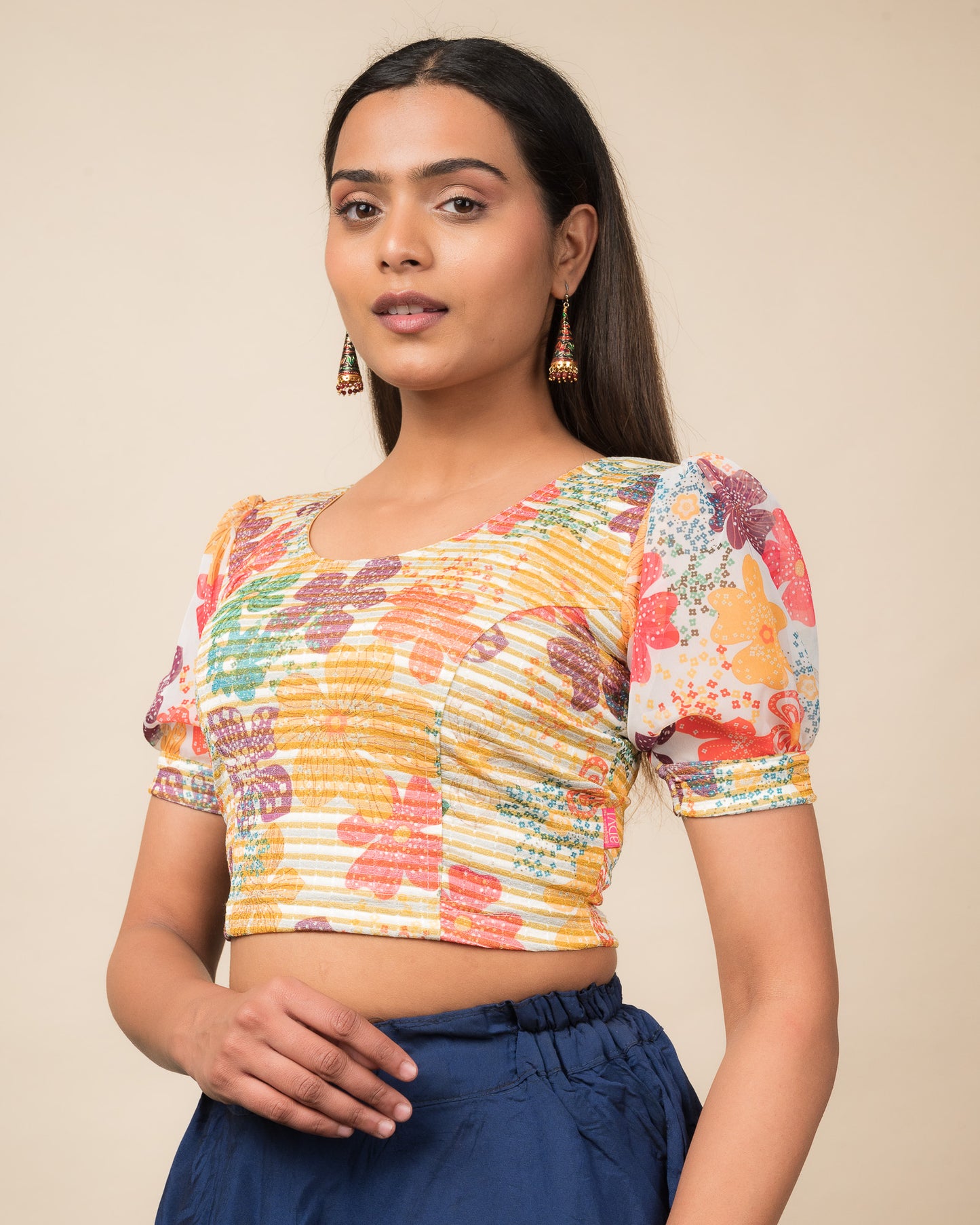 Side profile highlighting the puff sleeve volume and side fit.