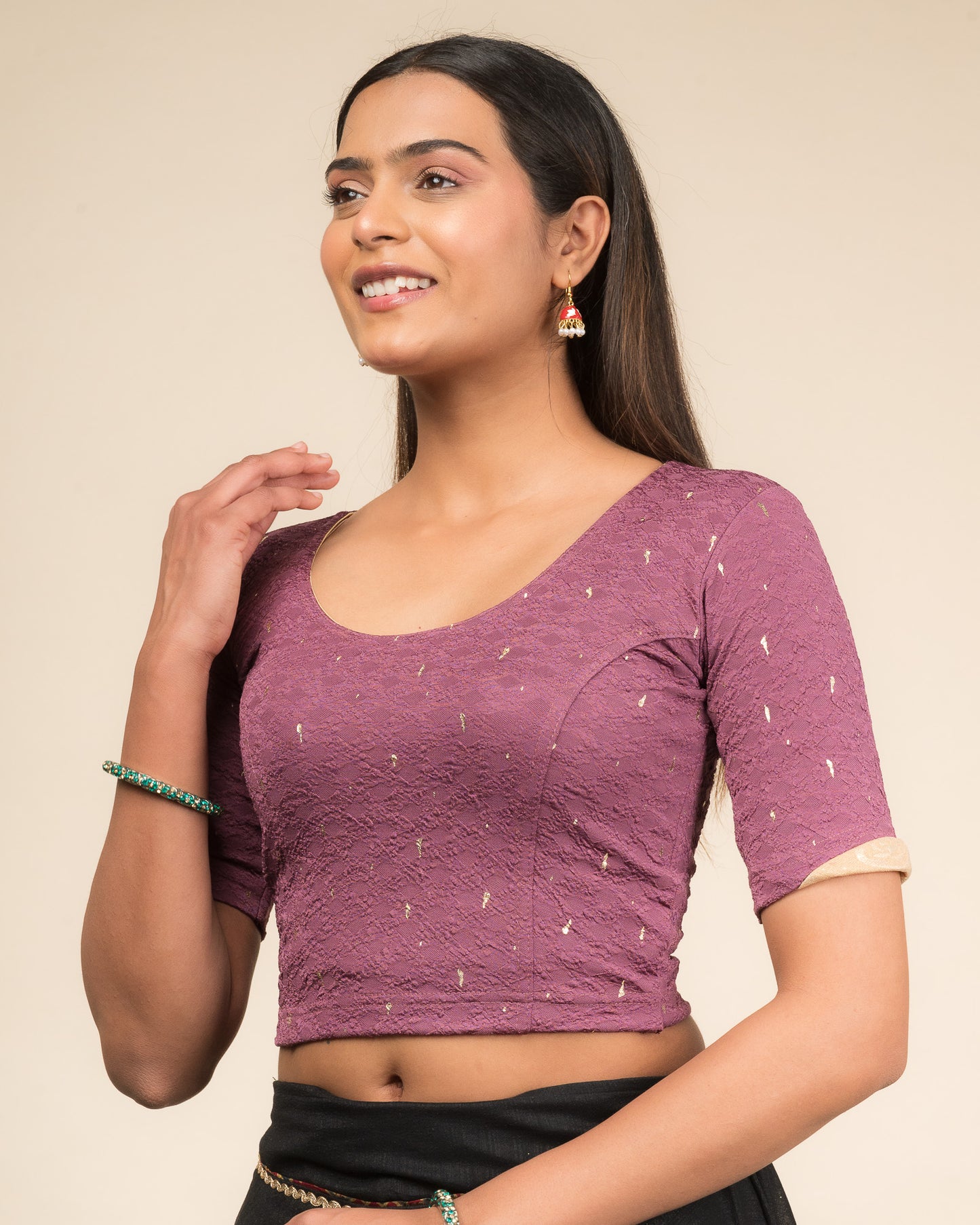 Side profile highlighting the sleeve fit and silhouette.