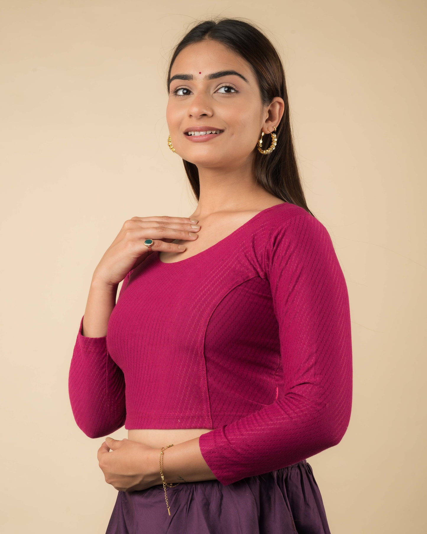 Side profile highlighting the sleeve length and silhouette