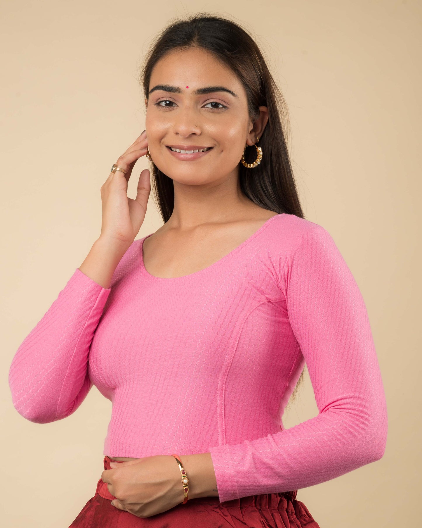 Side profile highlighting the sleeve length and silhouette