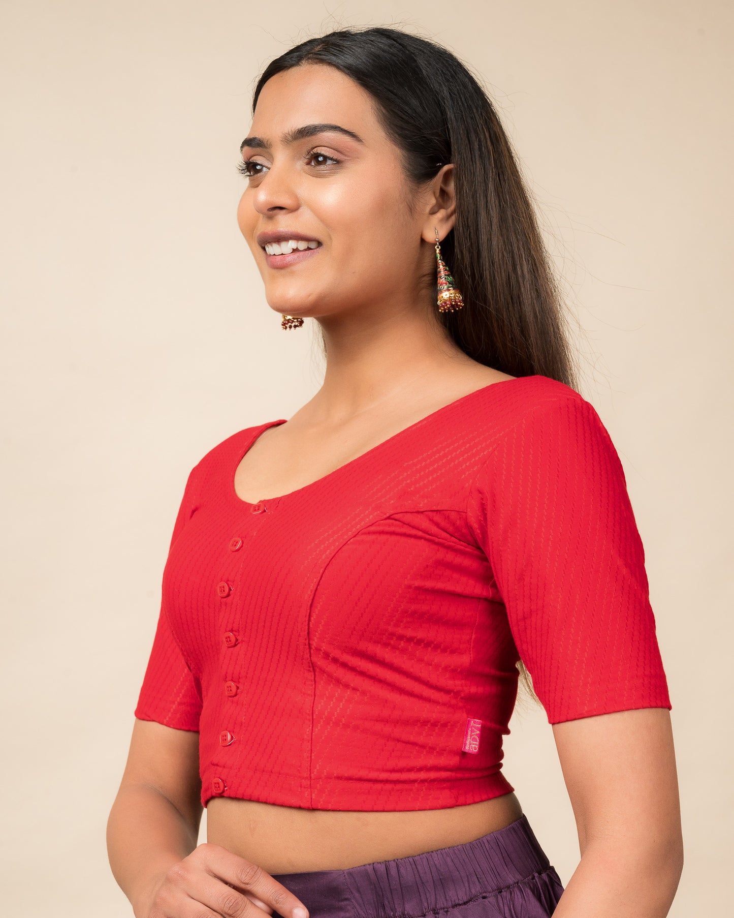 Side profile highlighting the sleeve length and silhouette.