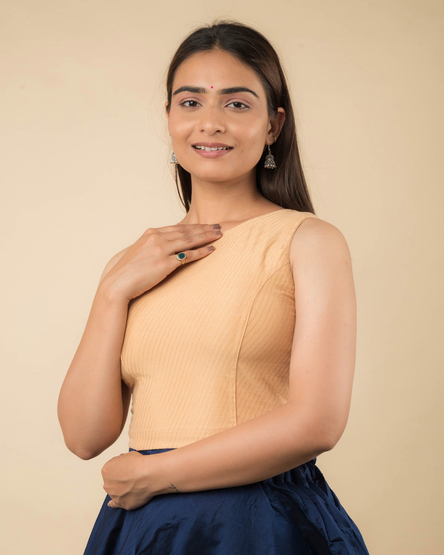 Side profile highlighting the fit and high neckline