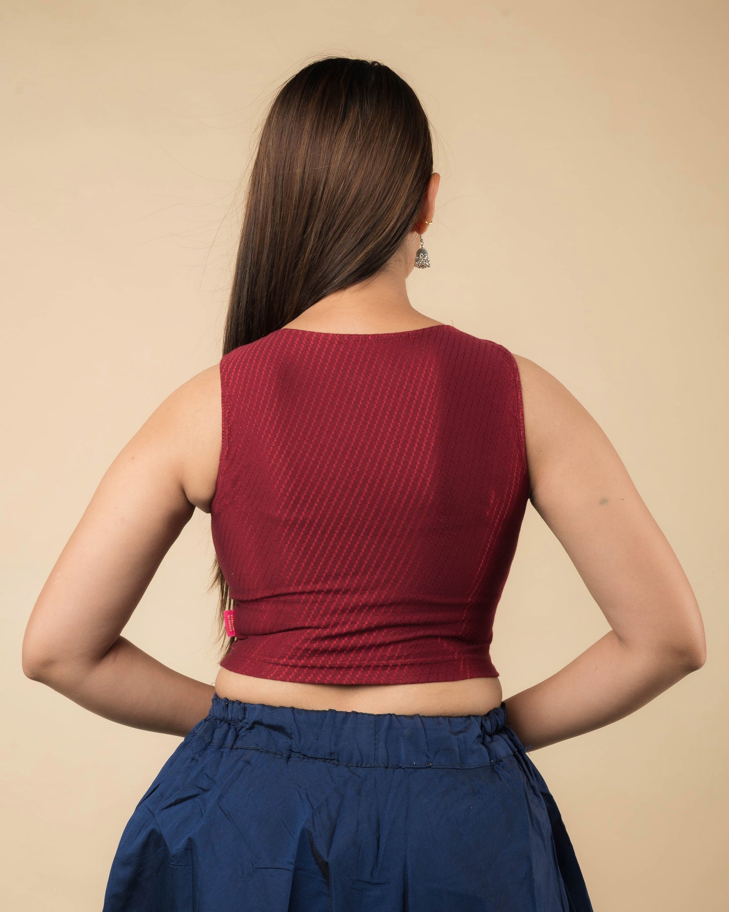 Rear view showcasing the back design of the slip-on blouse