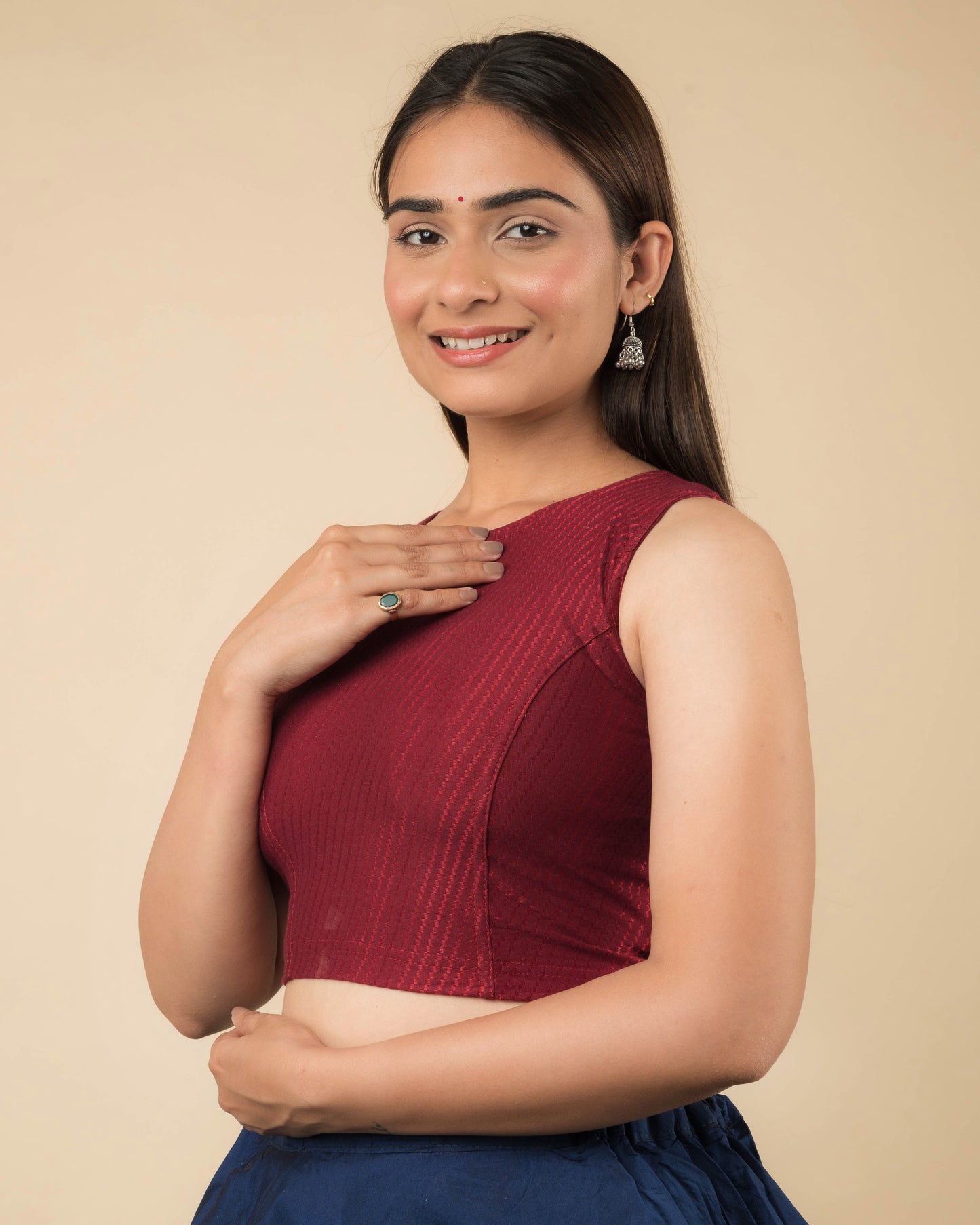 Side profile highlighting the fit and high neckline