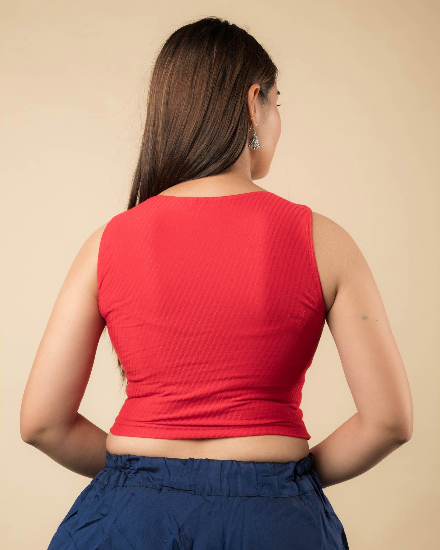 Rear view showcasing the back design of the slip-on blouse