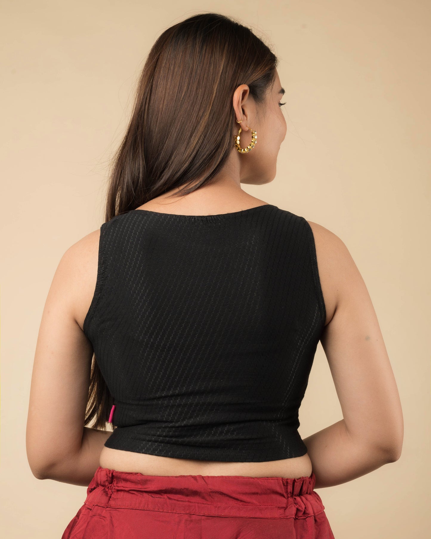 Rear view showcasing the back design of the slip-on blouse