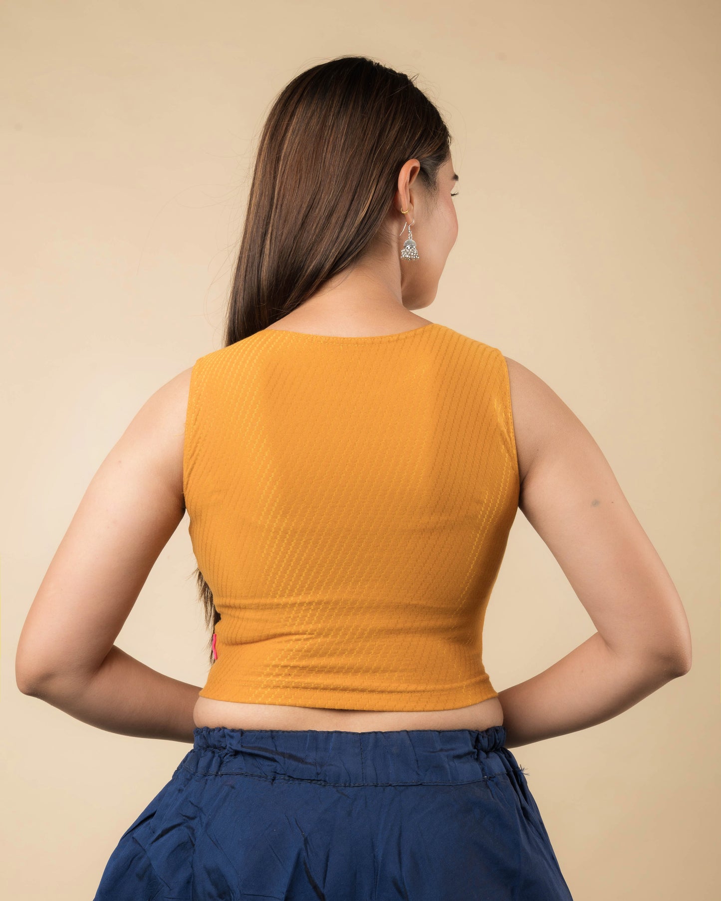 Rear view showcasing the back design of the slip-on blouse