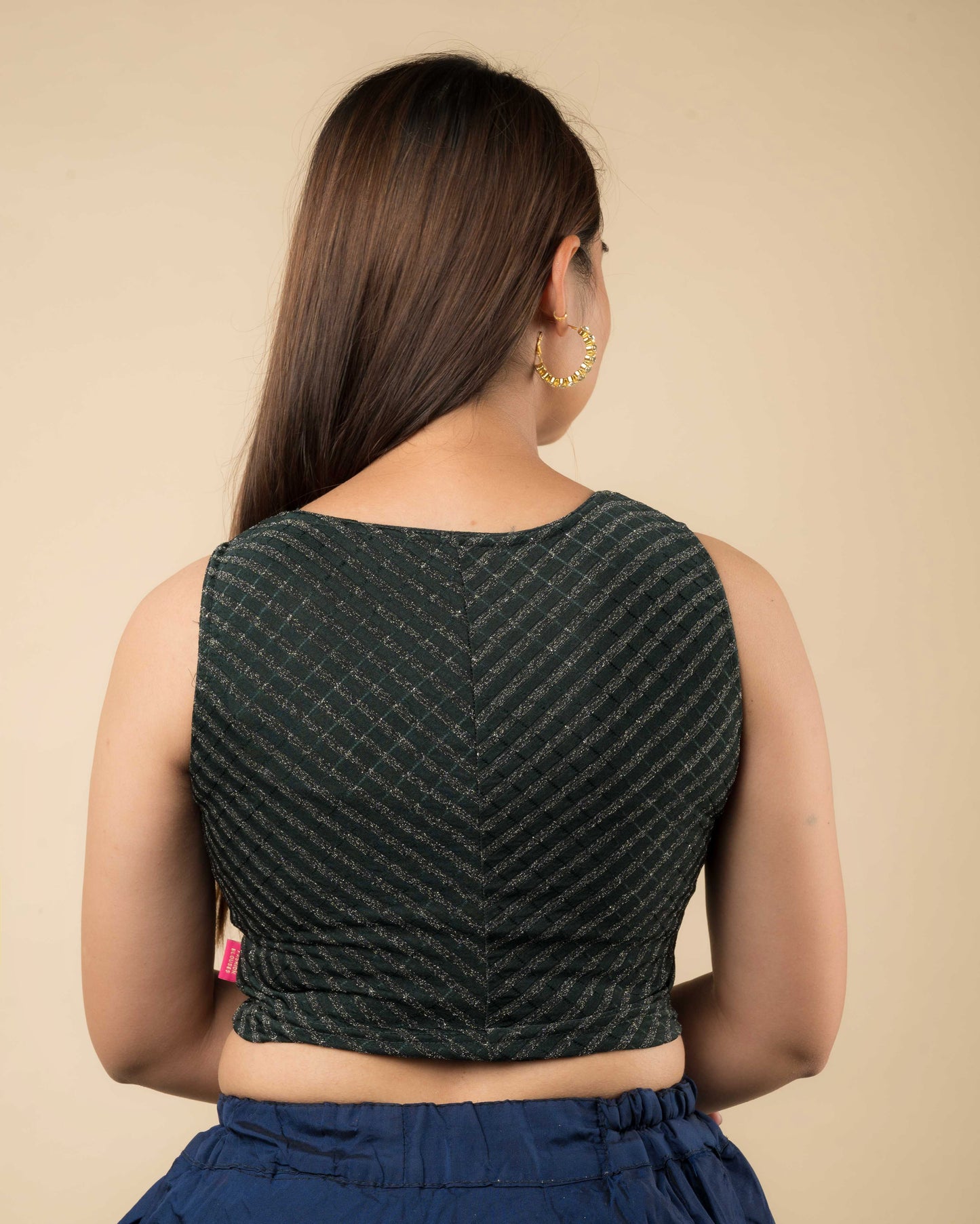 Dhara Bottle Green Striped Stretchable Sleeveless Blouse by Advi