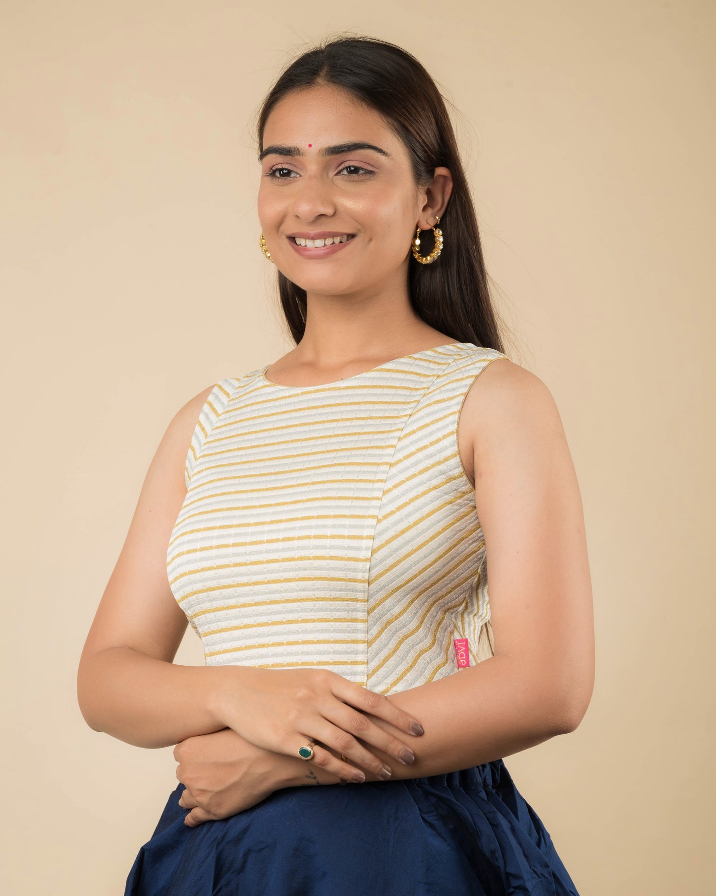 Dhara Cream Striped Boat Neck Stretchable Blouse by Advi