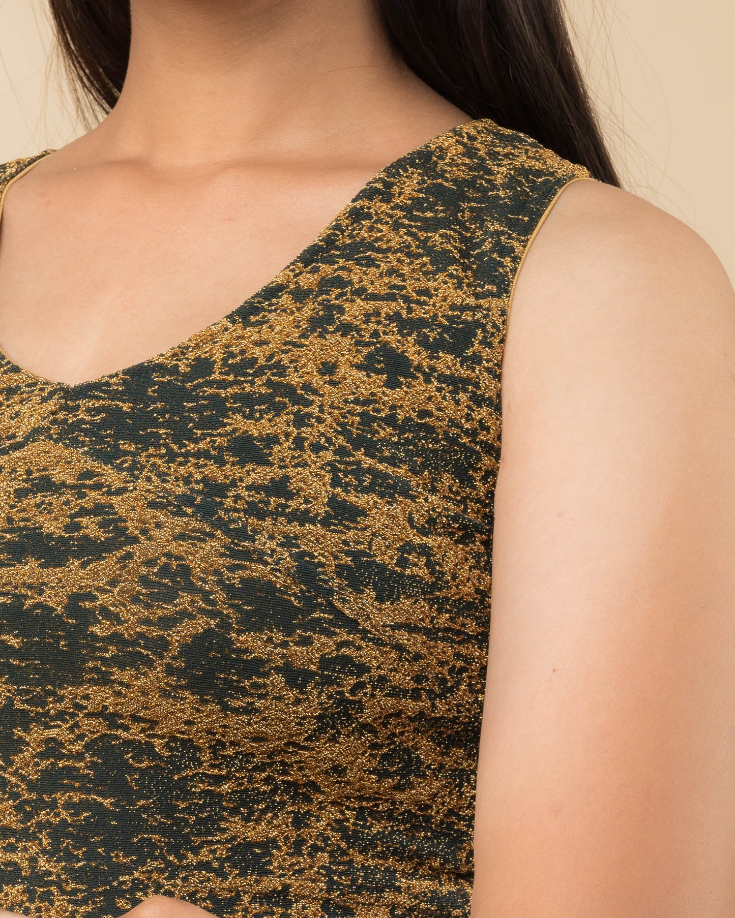 Shaheen Bottle Green Brocade Zari Sleeveless V Neck Stretch Blouse by Advi
