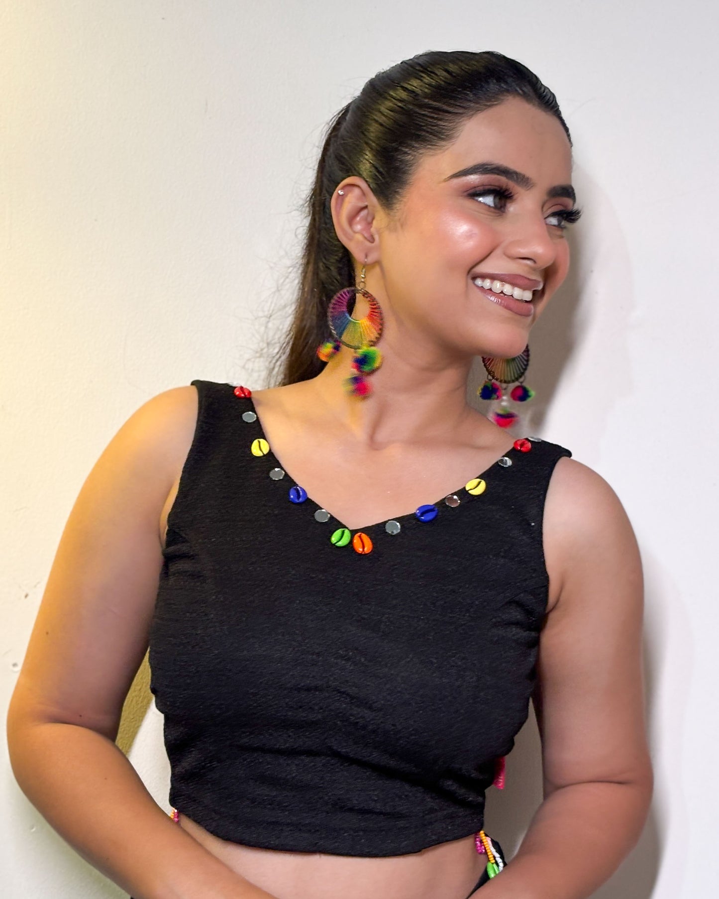 Pankhida Black Festive Sleeveless Stretchable Blouse with Cowri & Mirror Work