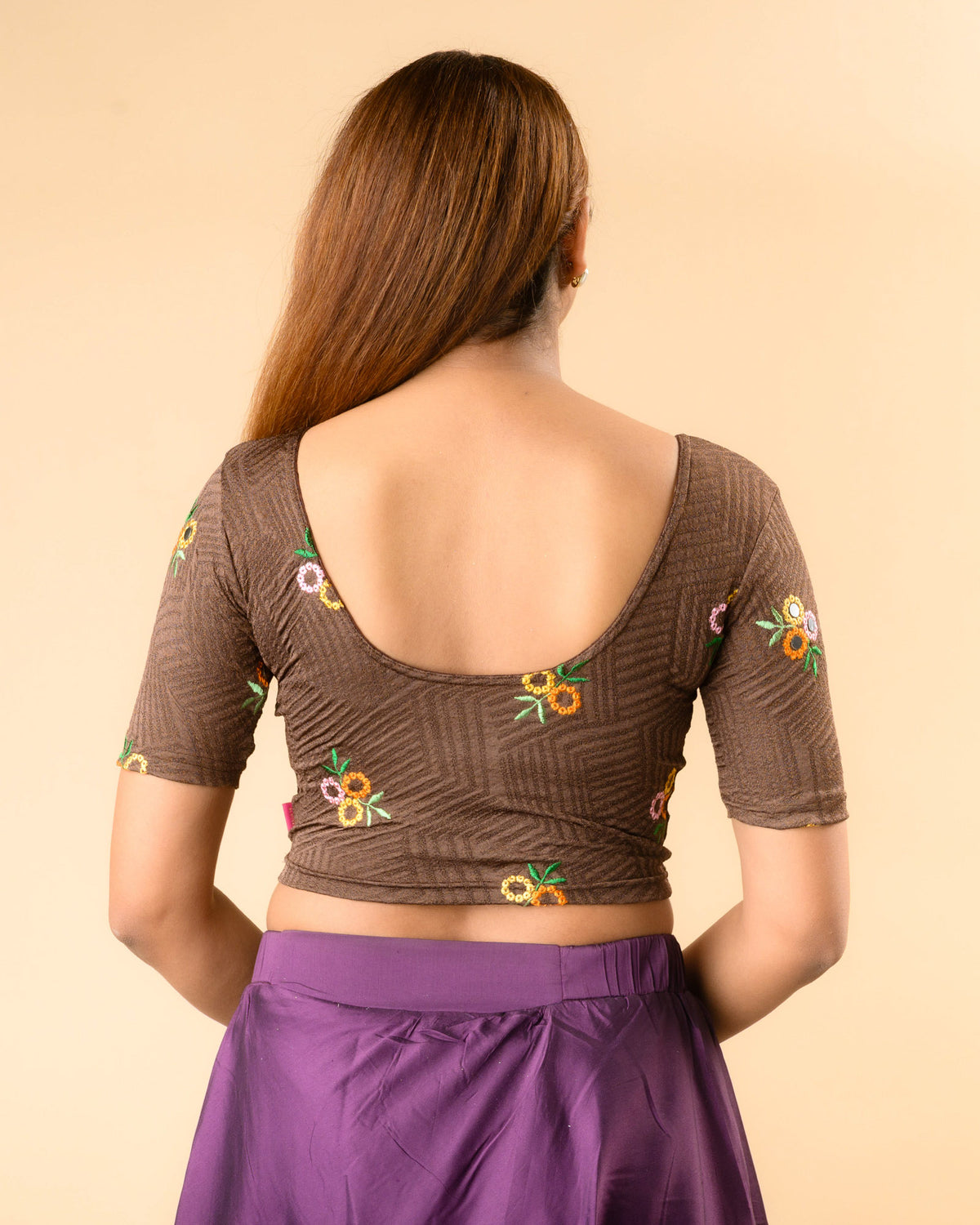 Jheeni coffee blouse showing the deep U back with floral buti by Advi - back