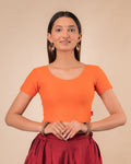Dobby Orange Half Sleeve Cotton Dobby Textured Slip On Blouse by Advi