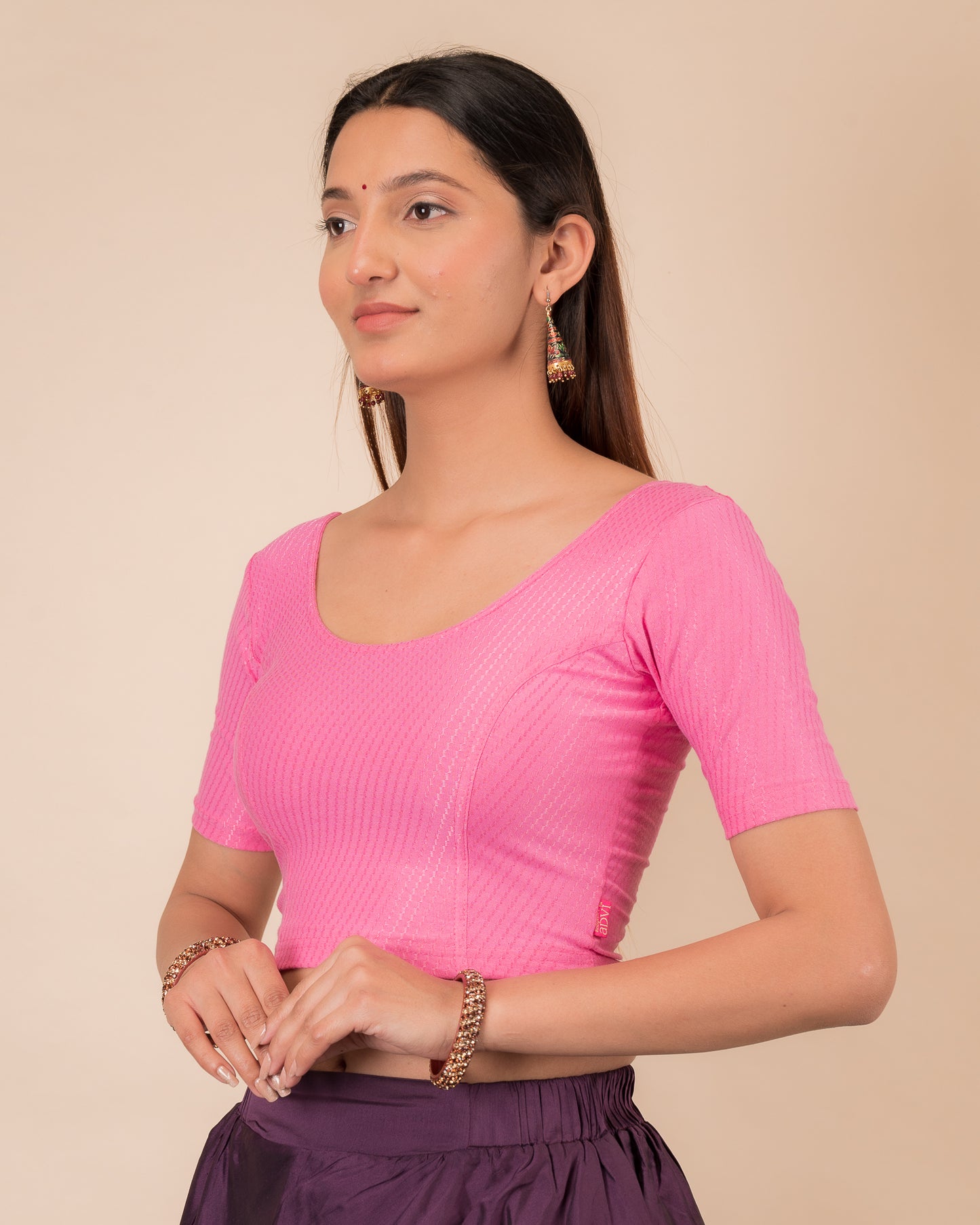 Side profile highlighting sleeve length and silhouette