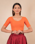 Dobby Orange Cotton Textured Elbow Sleeve Round Neck Blouse by Advi