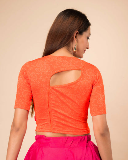Ambreen Orange Frill Jacquard Blouse with Fancy Back Cut by Advi