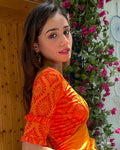 Shehzaadi Orange Self Design Blouse with Elbow Frill Sleeves Advi