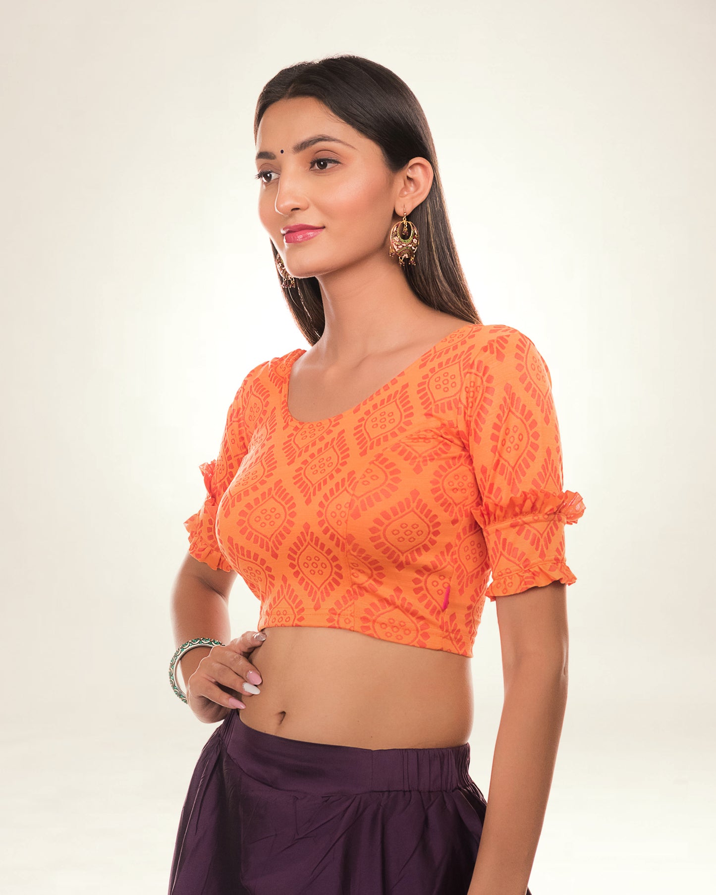 Shehzaadi Orange Self Design Blouse with Elbow Frill Sleeves Advi