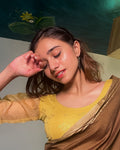 Kaanchi Beige Embellished Gold Print Blouse with Organza Sleeves by Advi