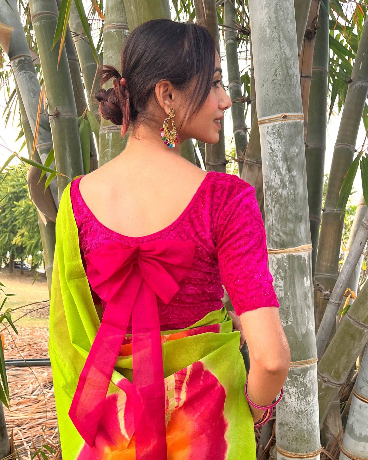 Gulshan Rani Velvet Blouse with Organza Bow Detailing and Potli Back by Advi