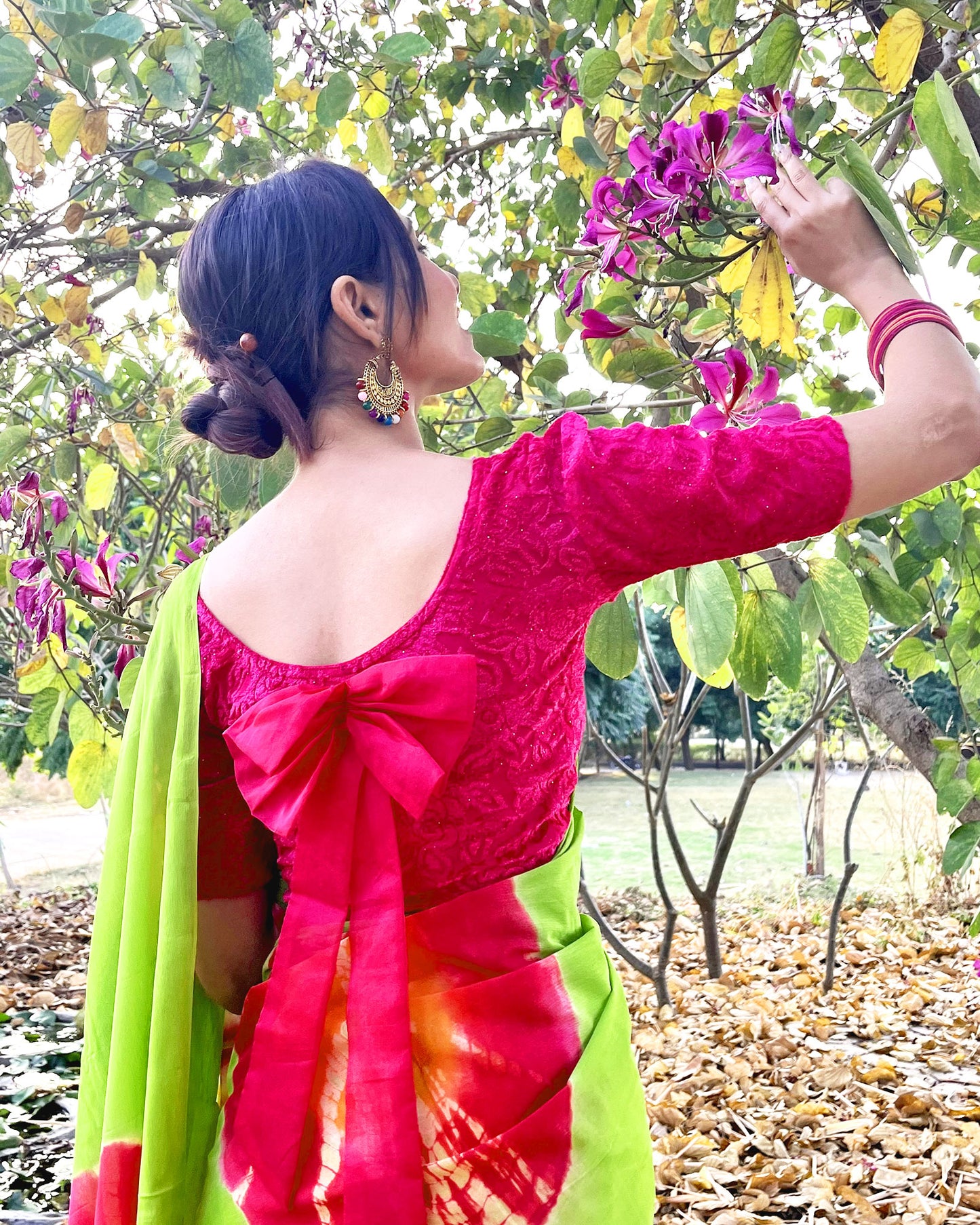 Gulshan Rani Velvet Blouse with Organza Bow Detailing and Potli Back by Advi