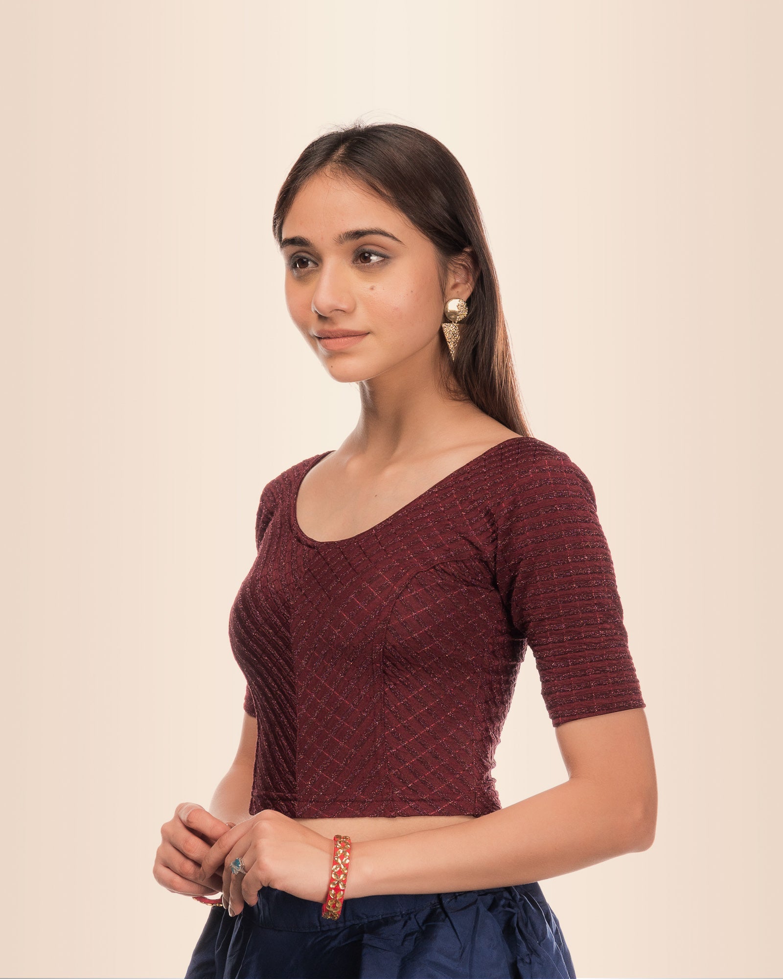 Side angle highlighting the sleeve length and overall silhouette