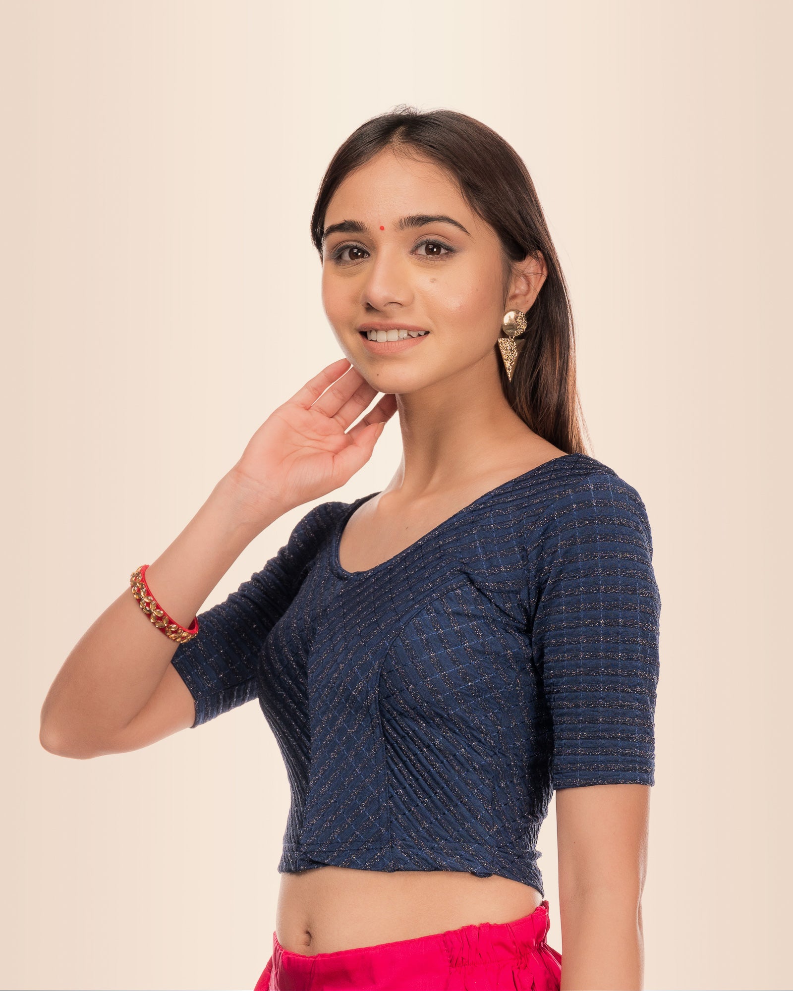 Side angle highlighting the sleeve length and overall silhouette