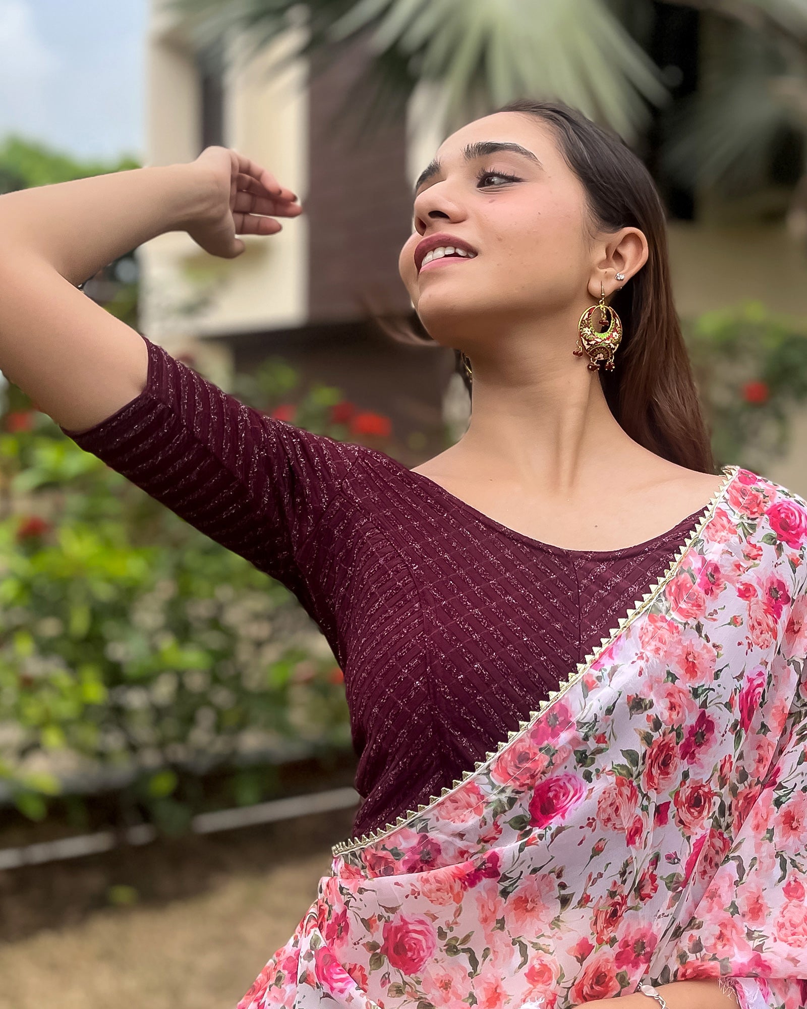 Model pairing the blouse with a saree for a bold, festive look