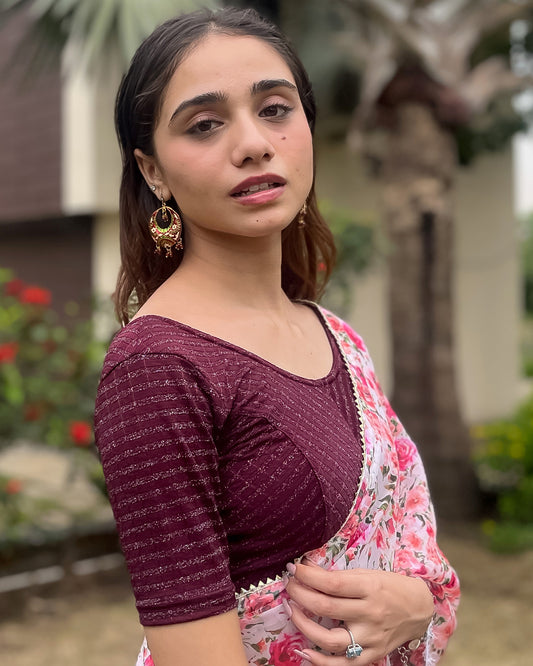 Model pairing the blouse with a saree for a bold, festive look
