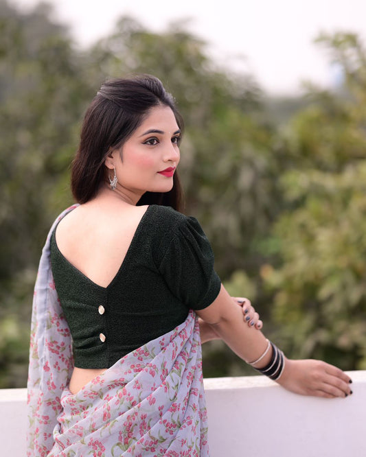 Model pairing the blouse with a saree for a polished festive ensemble