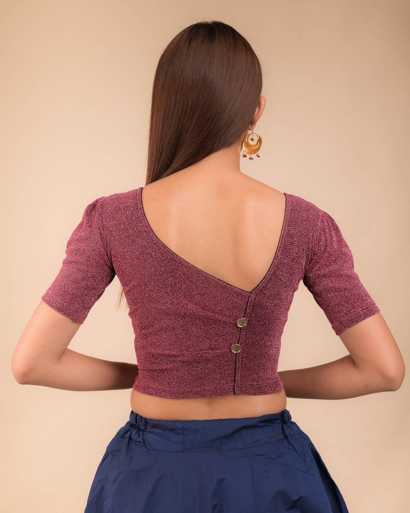 Rear view showcasing the back silhouette and half sleeves