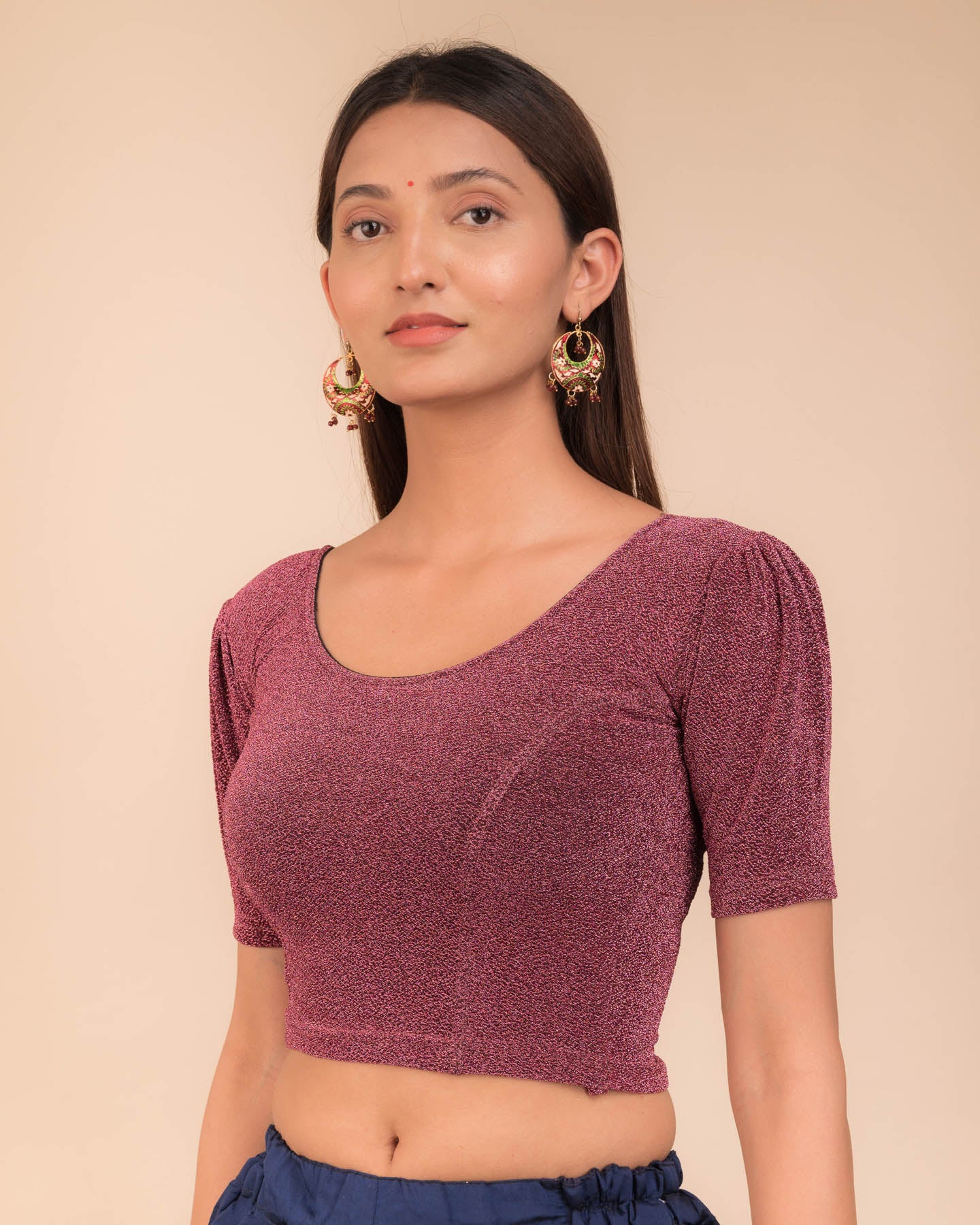 Side profile highlighting the textured pleats and fit.