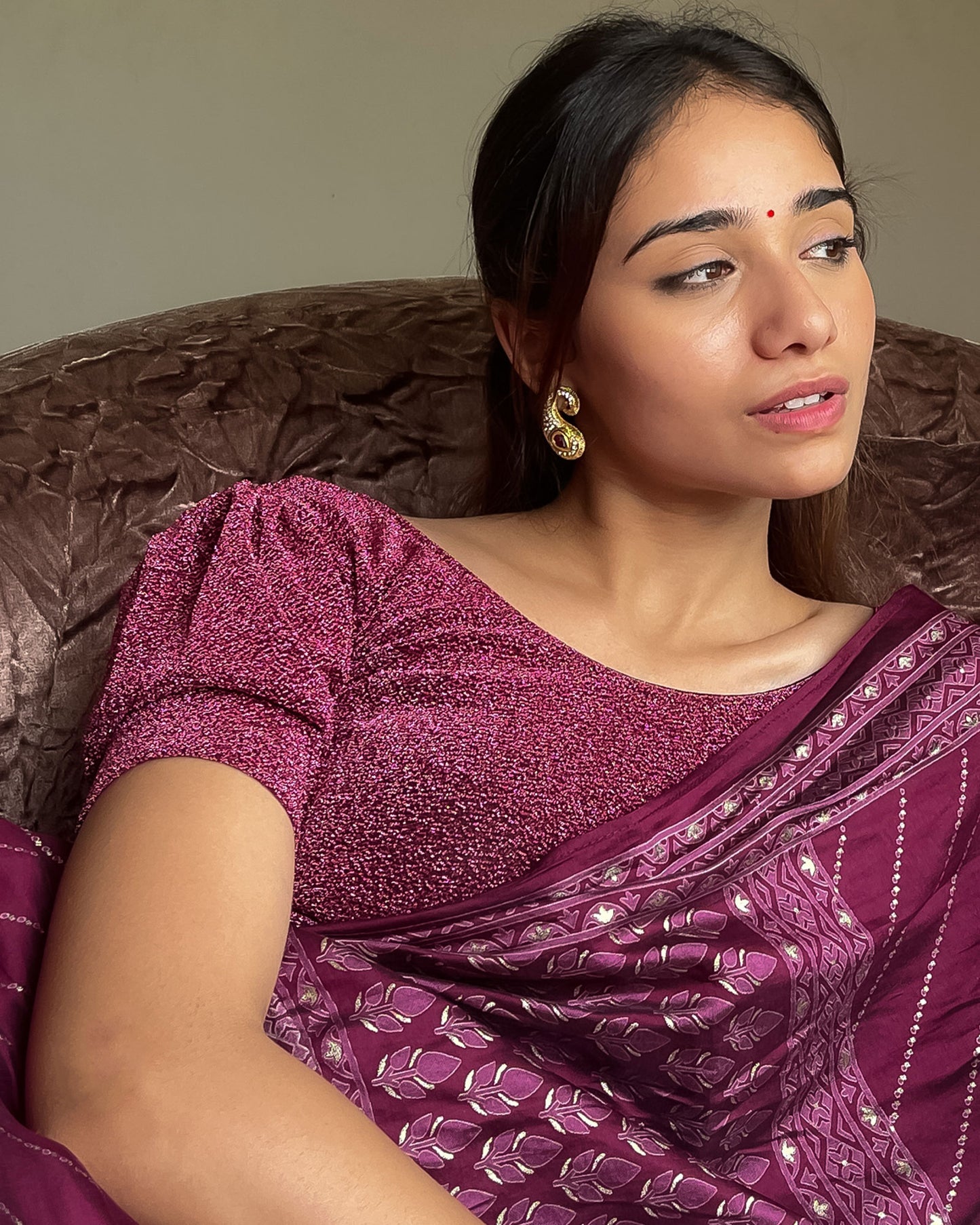 Model pairing the blouse with a saree for a polished festive ensemble